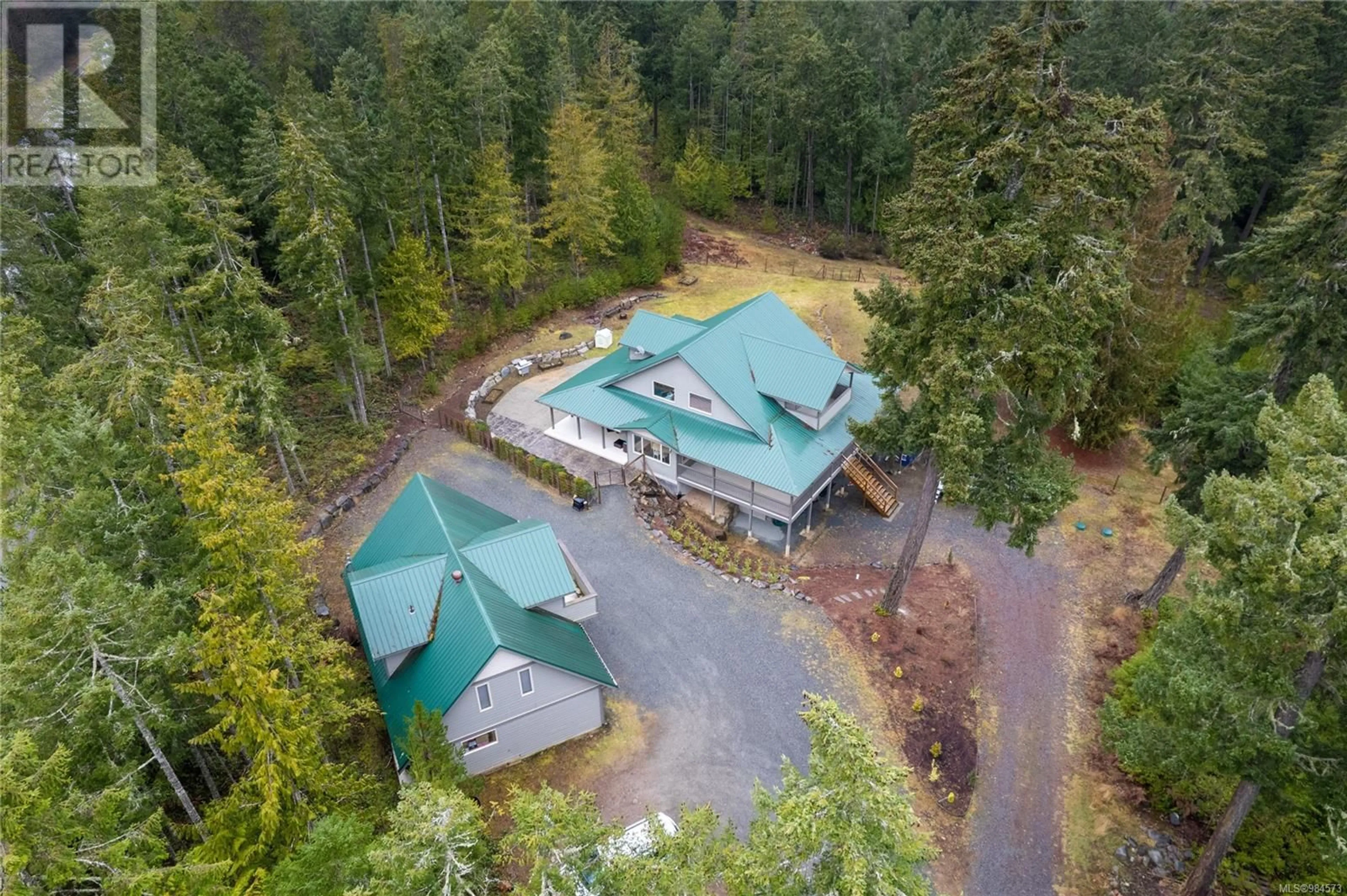 A pic from outside/outdoor area/front of a property/back of a property/a pic from drone, forest/trees view for 907 Hemsworth Rd, Qualicum Beach British Columbia V9K1R3