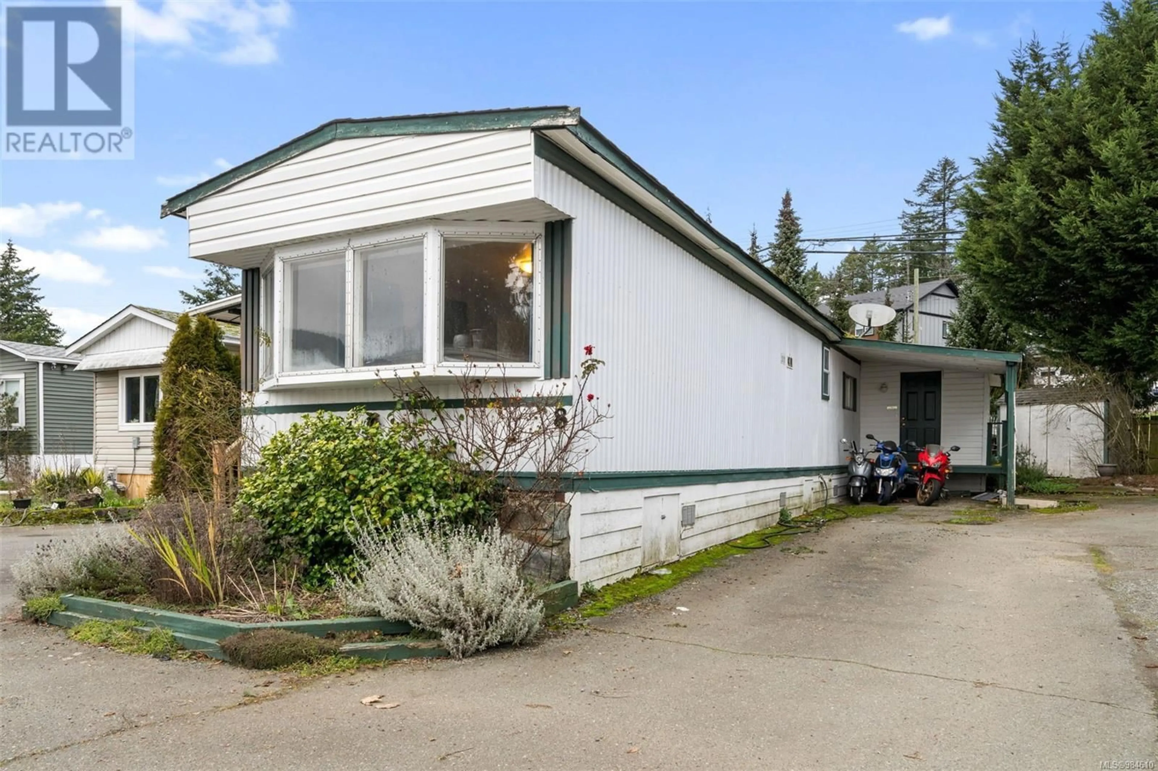 Home with vinyl exterior material, street for 8 2847 Sooke Lake Rd, Langford British Columbia V9B4P8