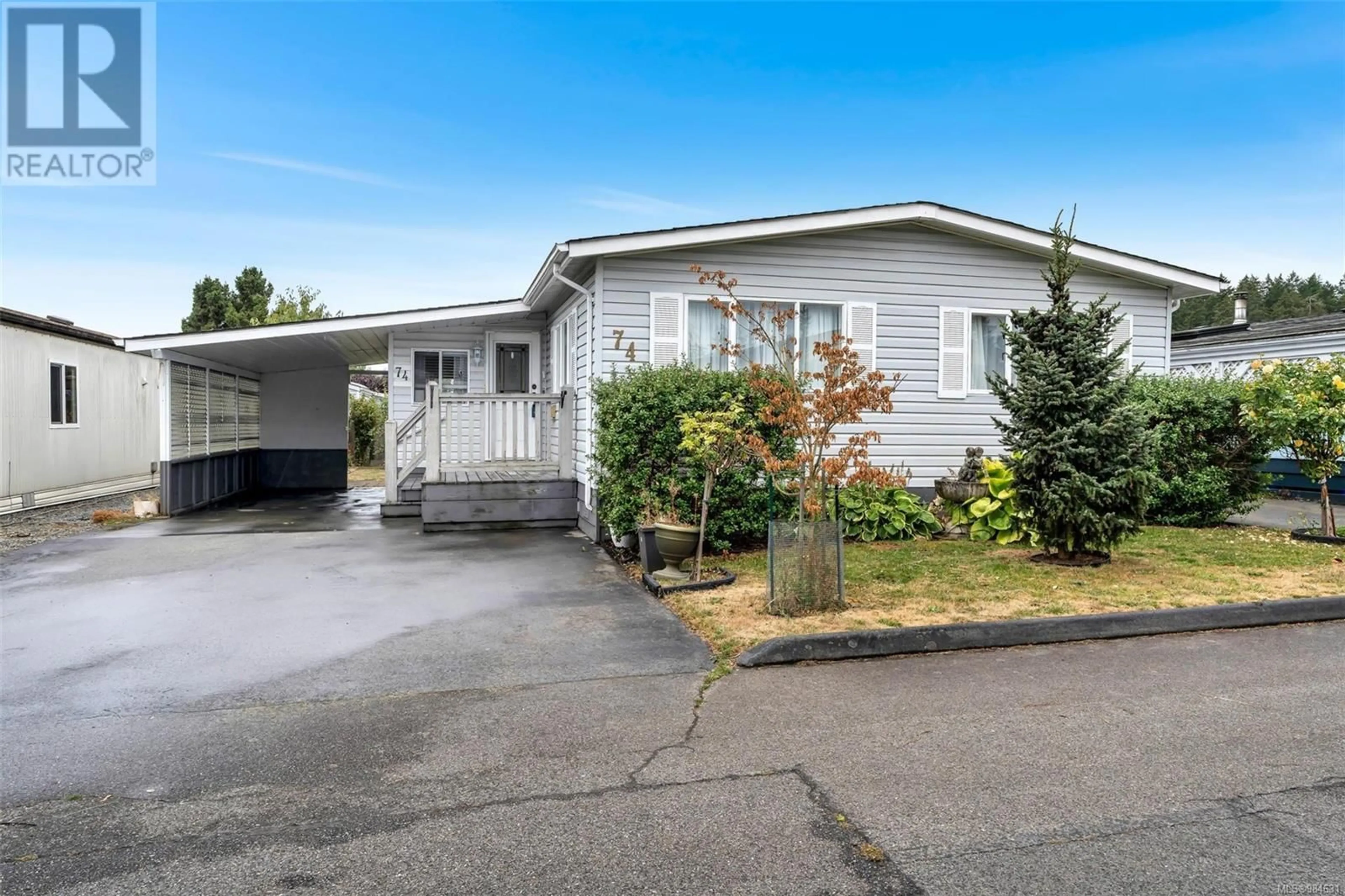 Home with vinyl exterior material, street for 74 7701 Central Saanich Rd, Central Saanich British Columbia V8M1X4