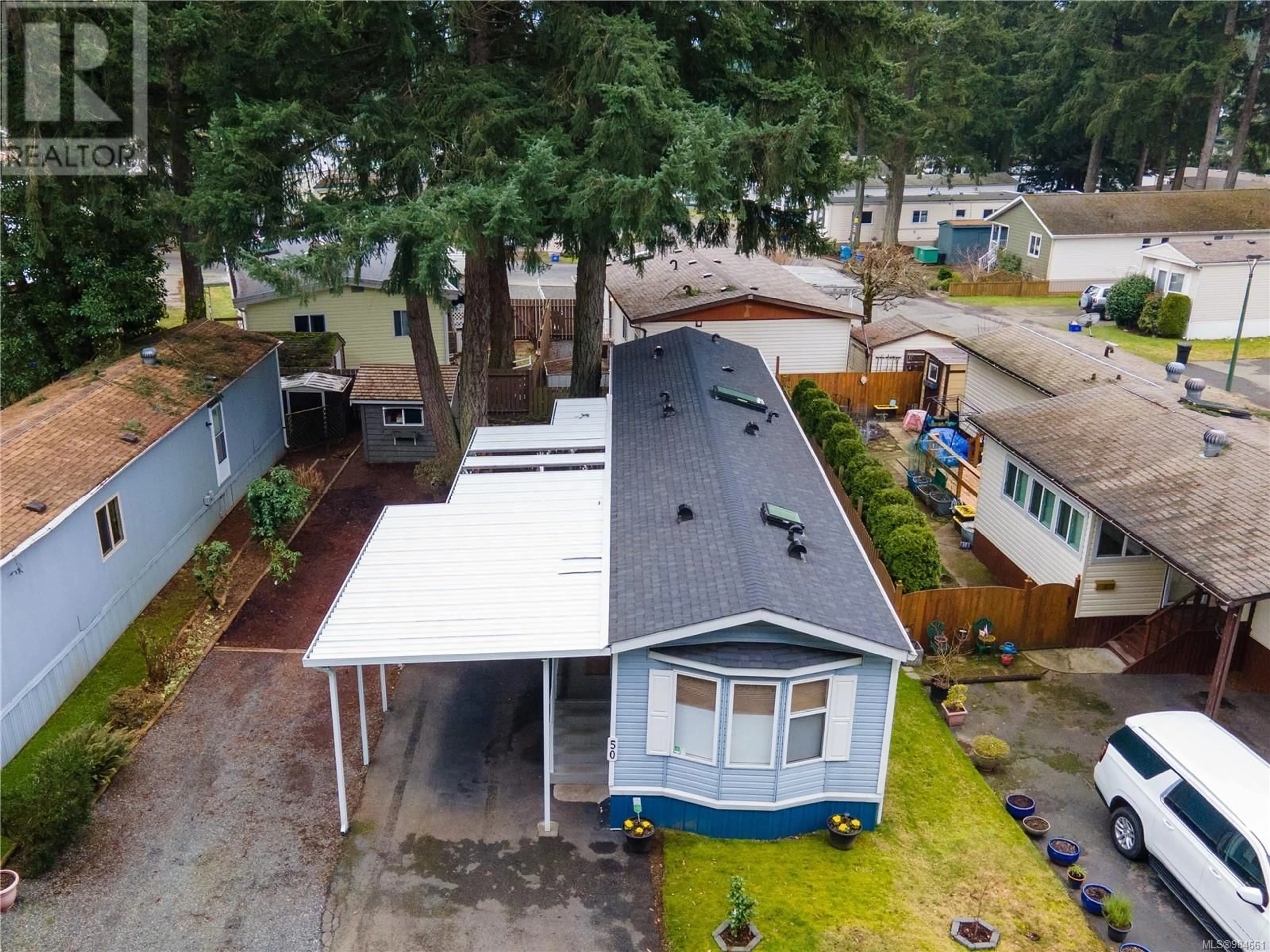 A pic from outside/outdoor area/front of a property/back of a property/a pic from drone, street for 50 5854 Turner Rd, Nanaimo British Columbia V9T2N6