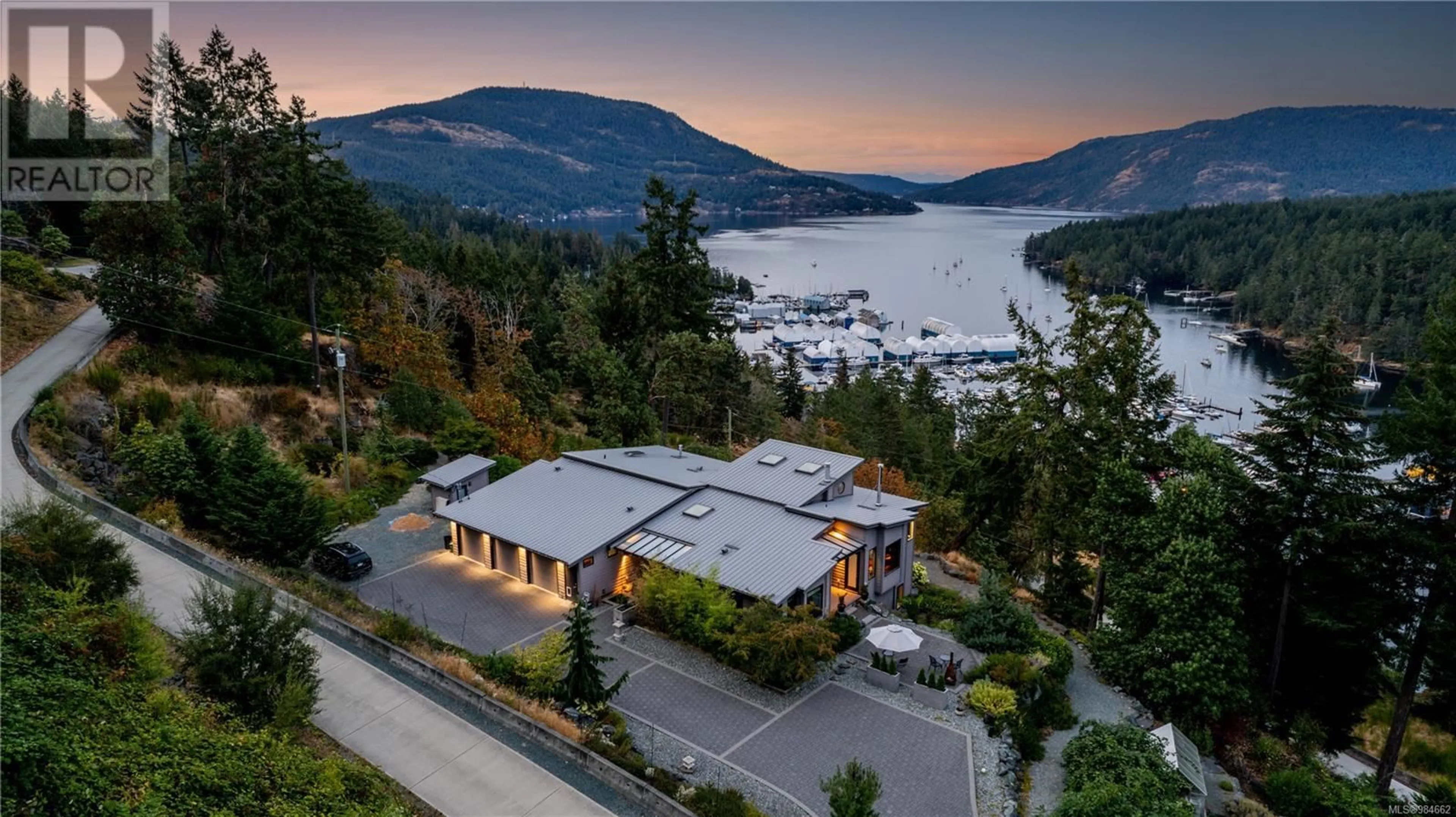 A pic from outside/outdoor area/front of a property/back of a property/a pic from drone, water/lake/river/ocean view for 6088 Genoa Bay Rd, Duncan British Columbia V9L5Y5