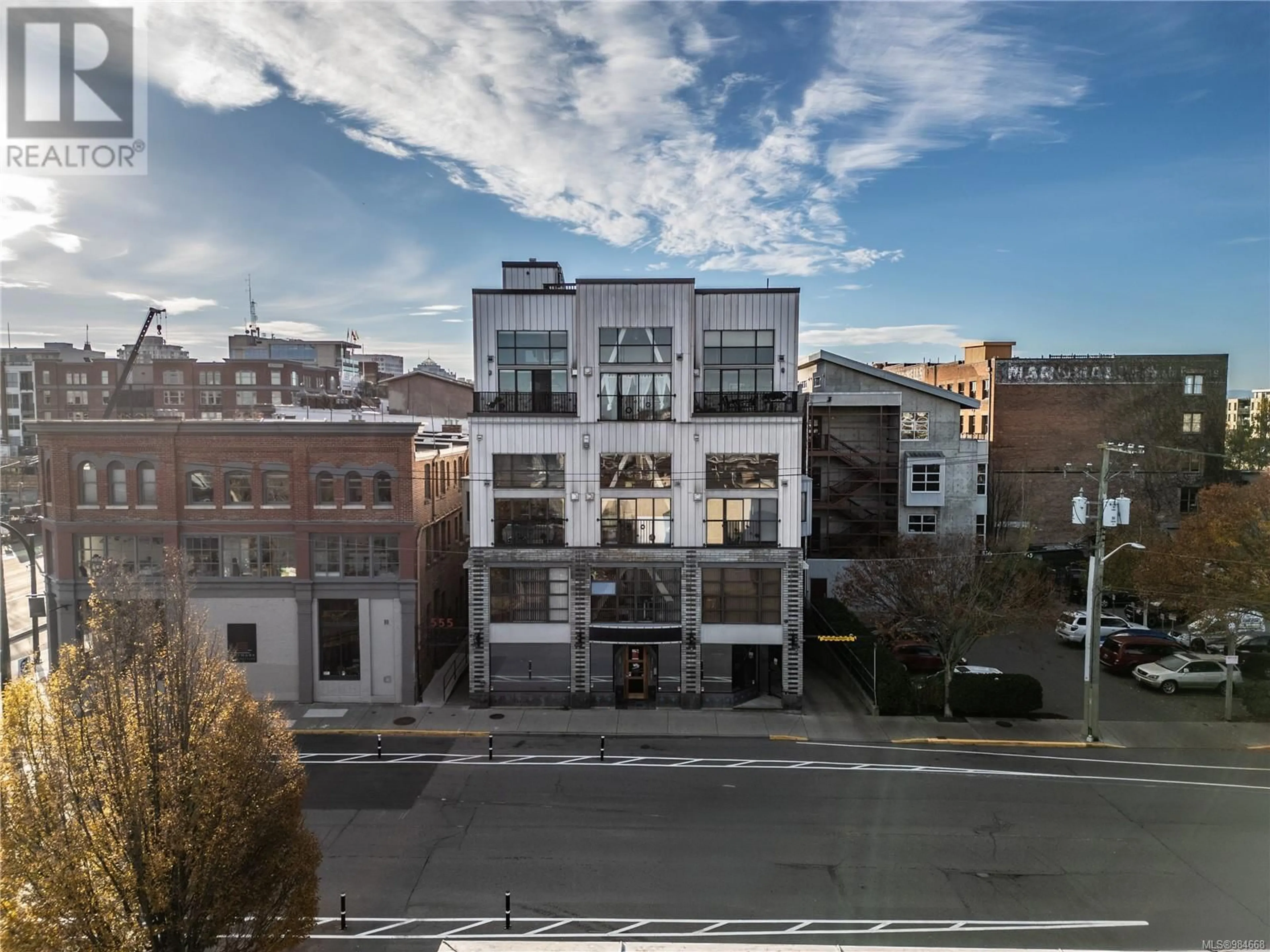 A pic from outside/outdoor area/front of a property/back of a property/a pic from drone, city buildings view from balcony for 303 555 Chatham St, Victoria British Columbia V8T1E1