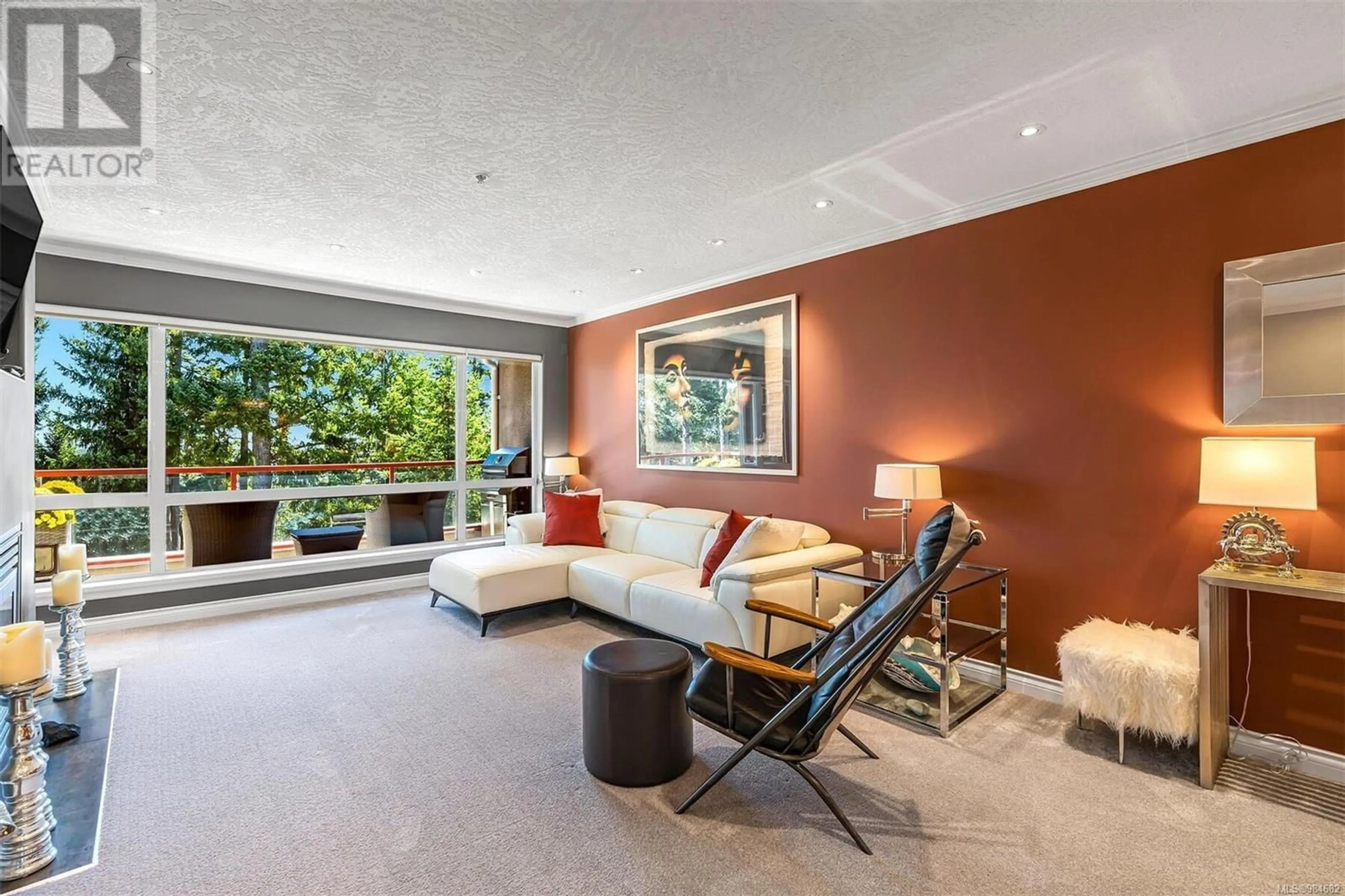 Living room with furniture, carpet floor for 502 940 Boulderwood Rise, Saanich British Columbia V8N3C7