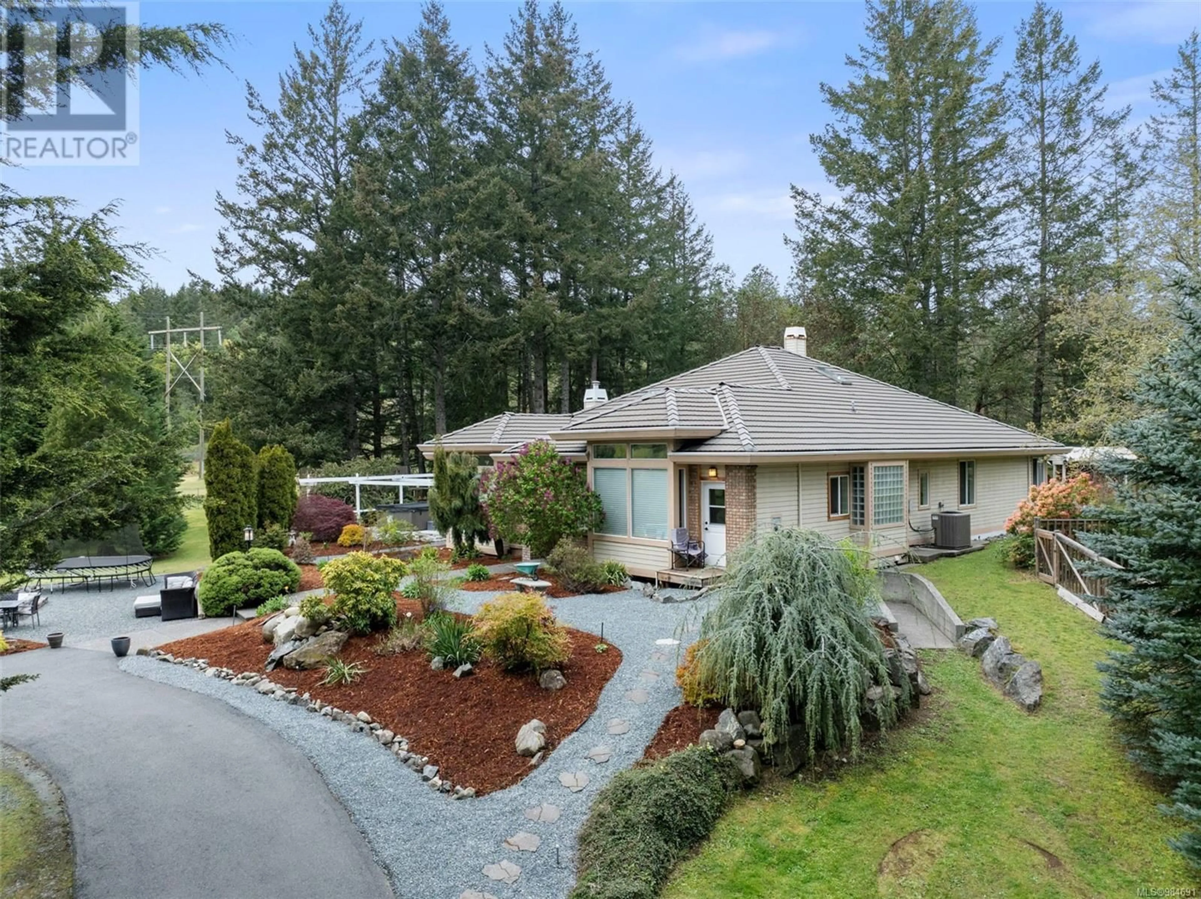 A pic from outside/outdoor area/front of a property/back of a property/a pic from drone, unknown for 2262 ROLLA PLACE, Highlands British Columbia V9E1H5