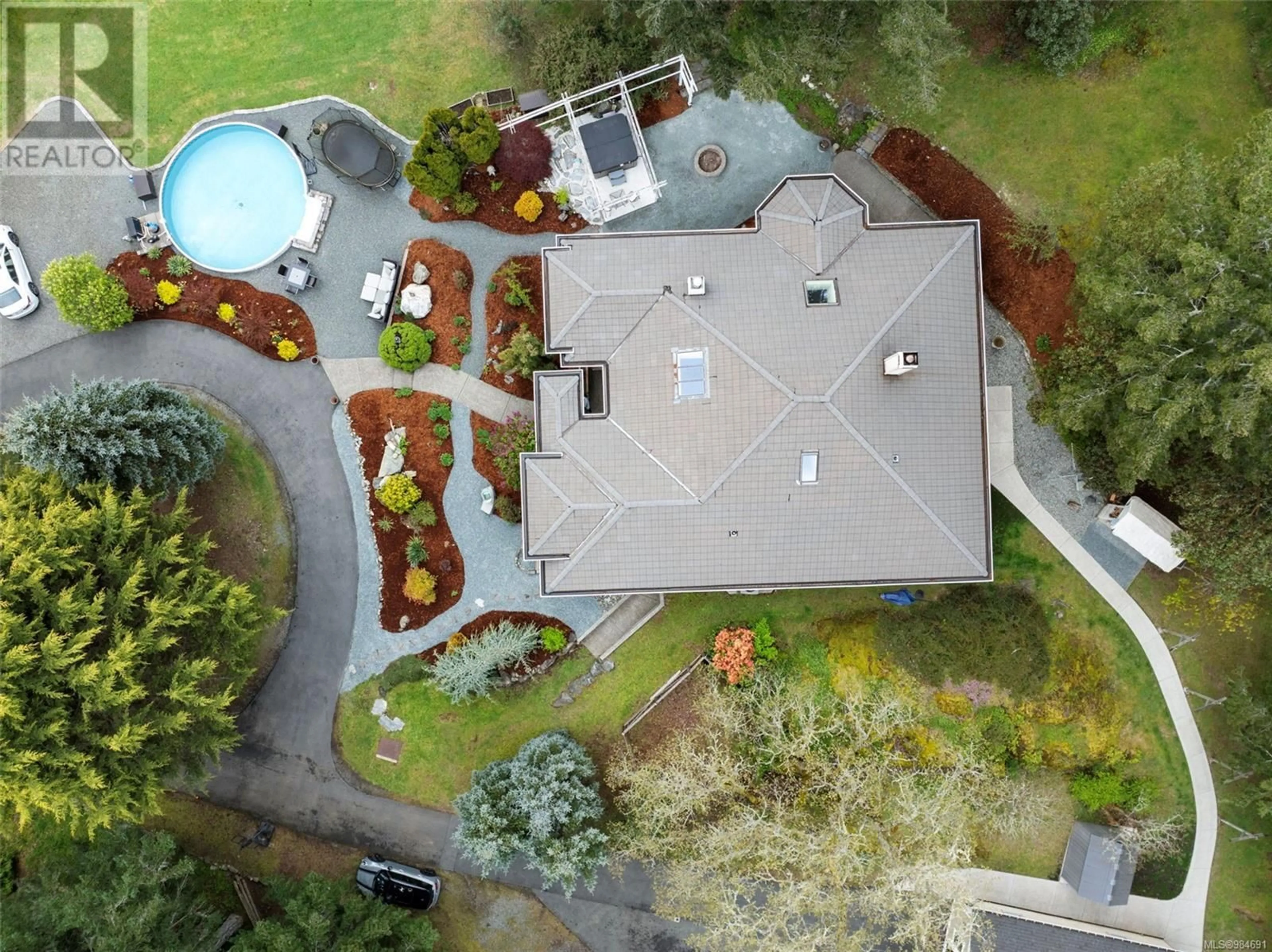 A pic from outside/outdoor area/front of a property/back of a property/a pic from drone, unknown for 2262 ROLLA PLACE, Highlands British Columbia V9E1H5