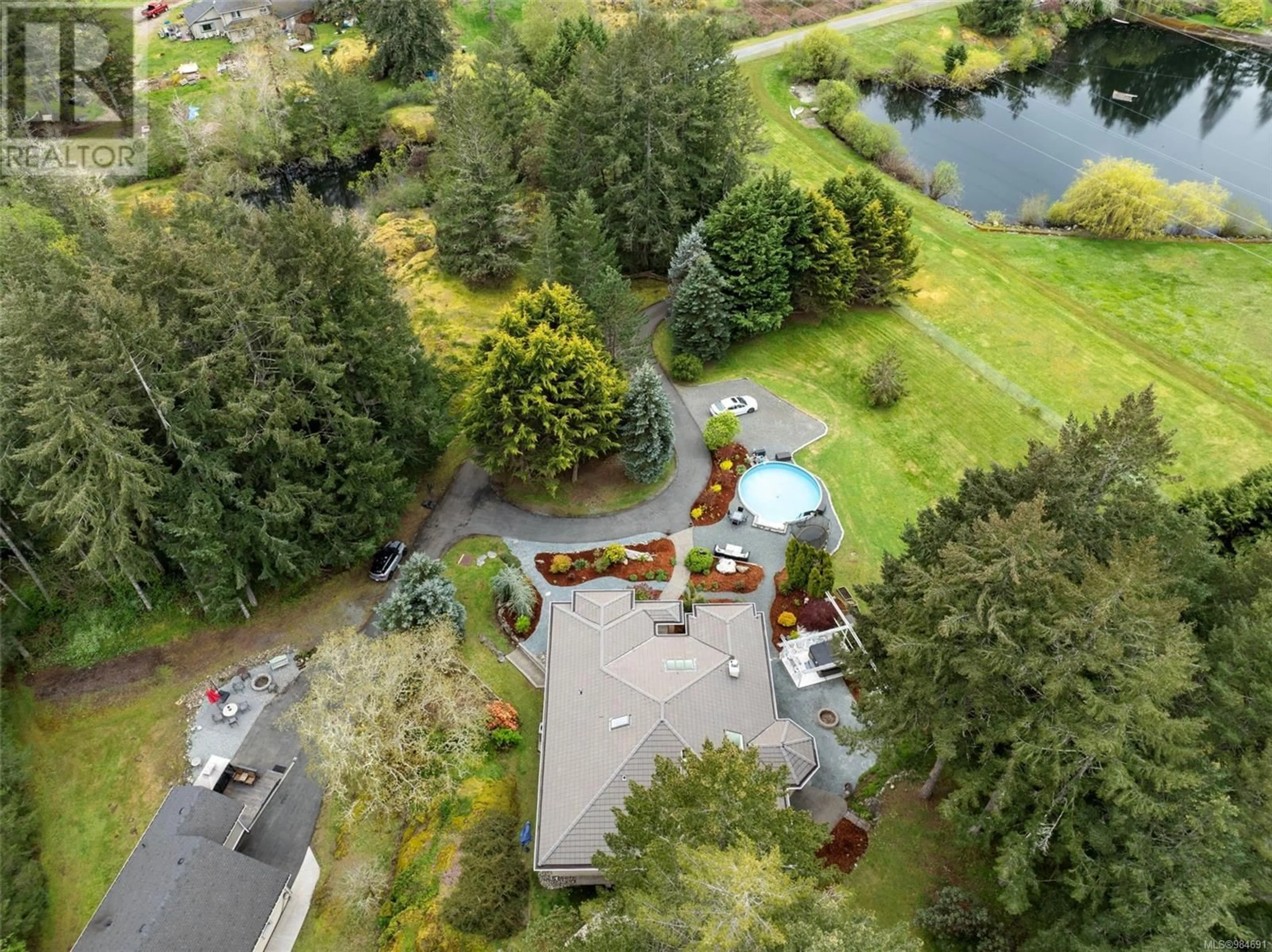 A pic from outside/outdoor area/front of a property/back of a property/a pic from drone, water/lake/river/ocean view for 2262 ROLLA PLACE, Highlands British Columbia V9E1H5