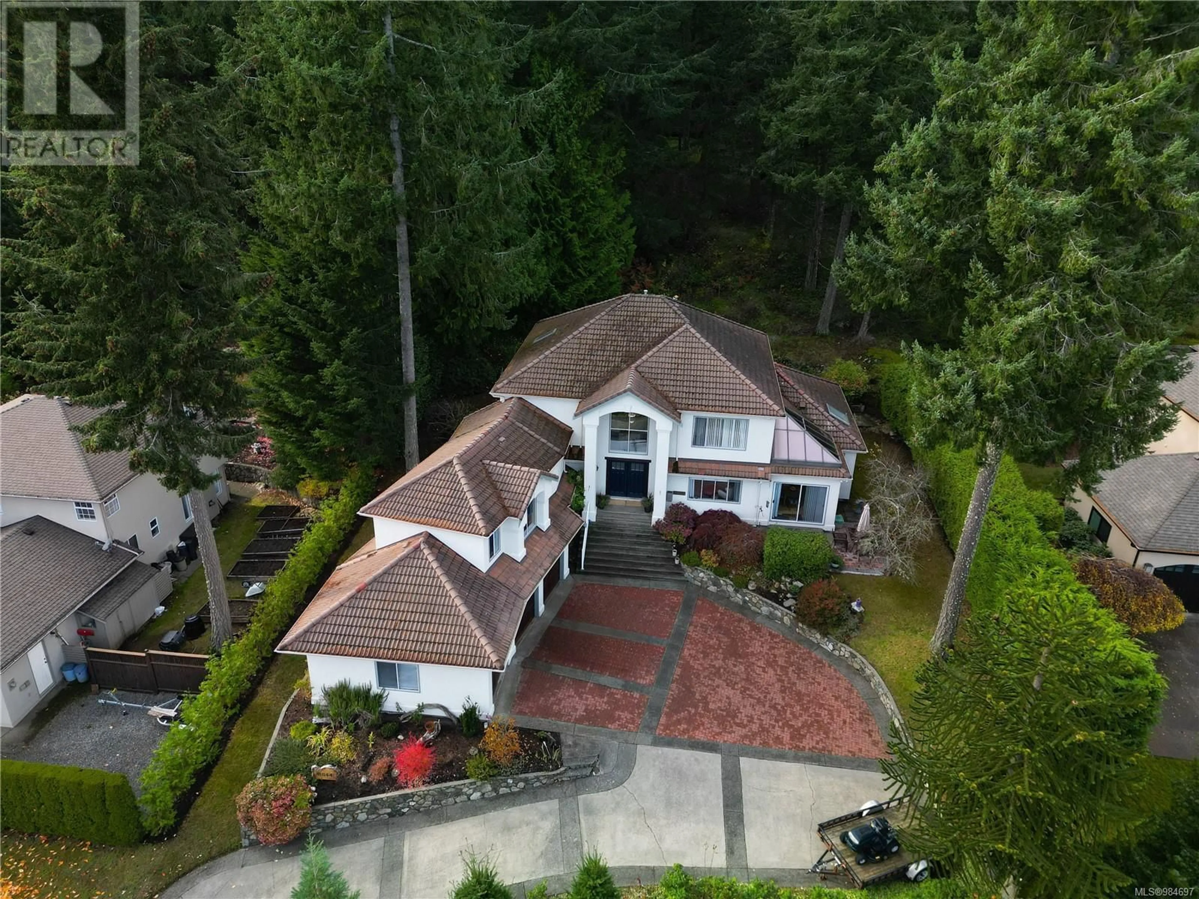 A pic from outside/outdoor area/front of a property/back of a property/a pic from drone, unknown for 8844 Carmanah Terr, North Saanich British Columbia V8L5E9