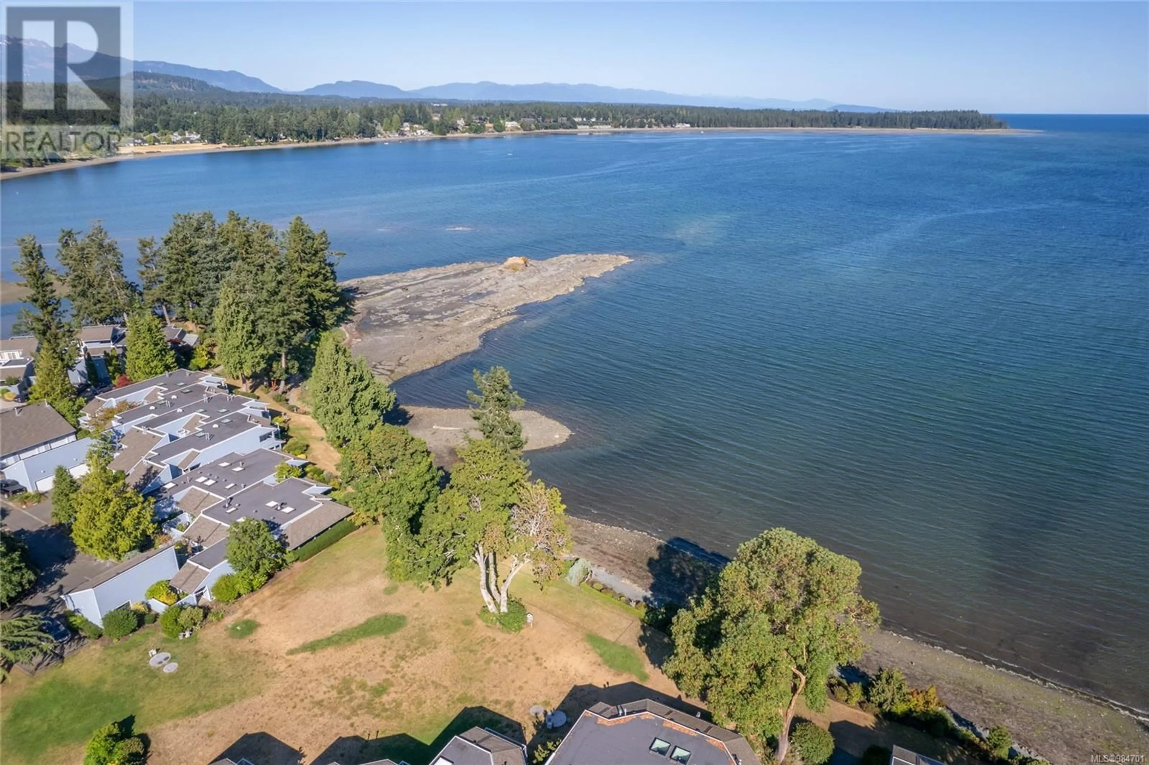 A pic from outside/outdoor area/front of a property/back of a property/a pic from drone, water/lake/river/ocean view for 232 1600 Stroulger Rd, Nanoose Bay British Columbia V9P9B7