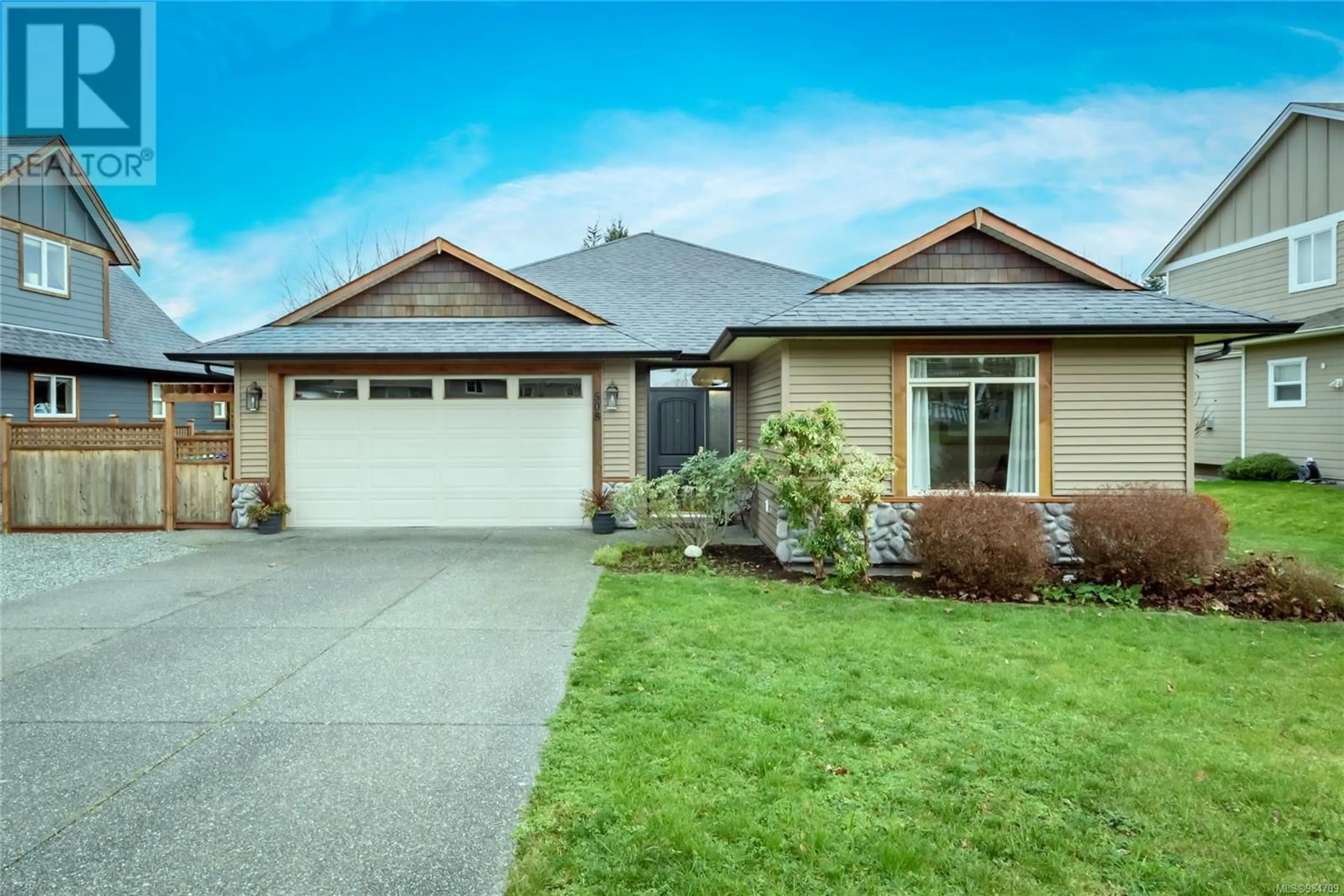 Home with vinyl exterior material, street for 508 Spitfire Dr, Comox British Columbia V9M0A7