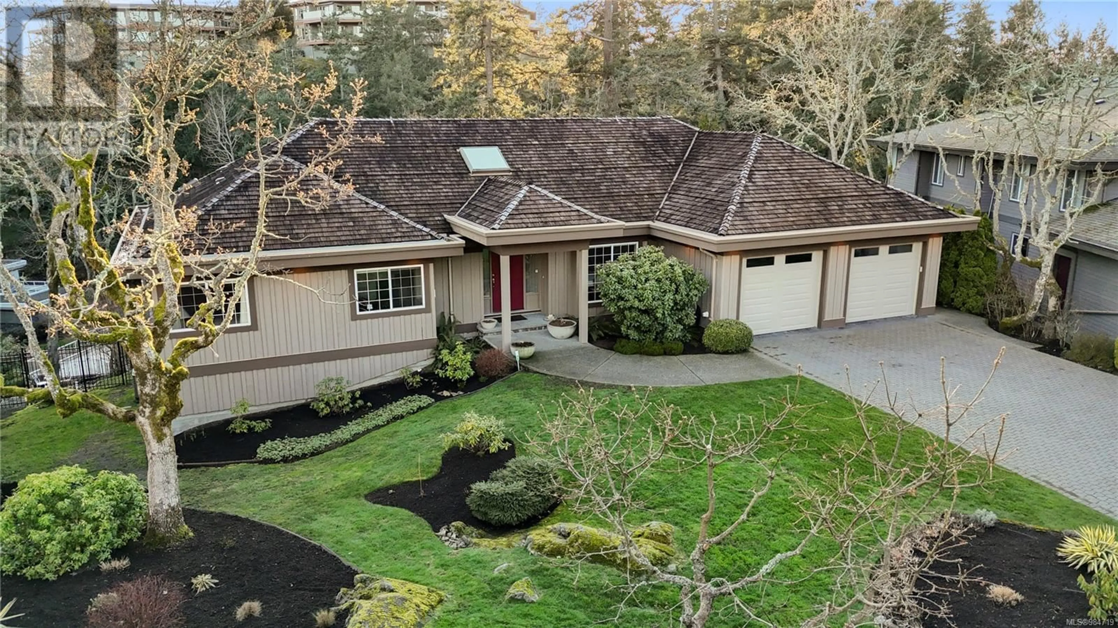 A pic from outside/outdoor area/front of a property/back of a property/a pic from drone, street for 4373 Wildflower Lane, Saanich British Columbia V8X5H1