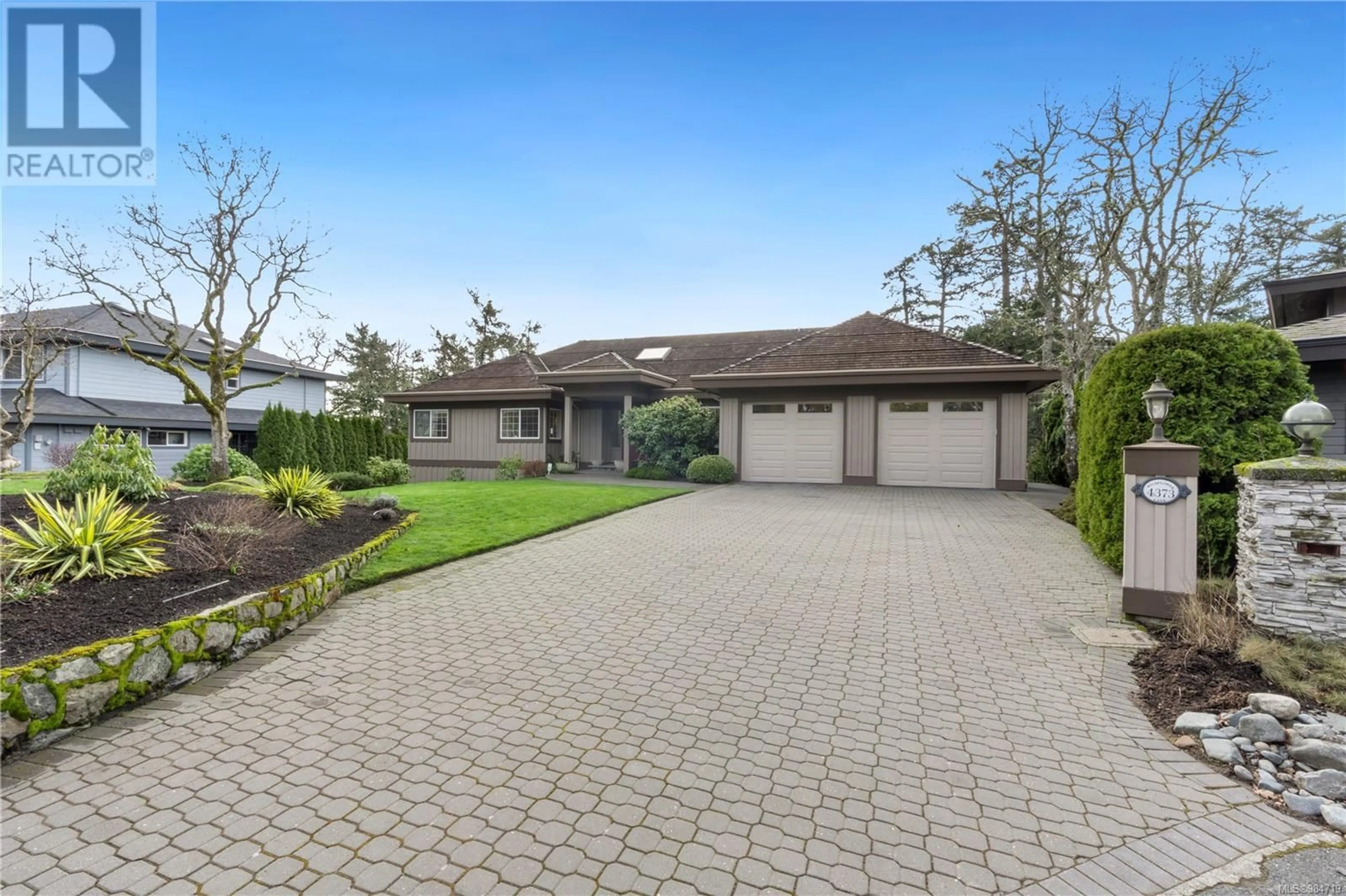 A pic from outside/outdoor area/front of a property/back of a property/a pic from drone, street for 4373 Wildflower Lane, Saanich British Columbia V8X5H1