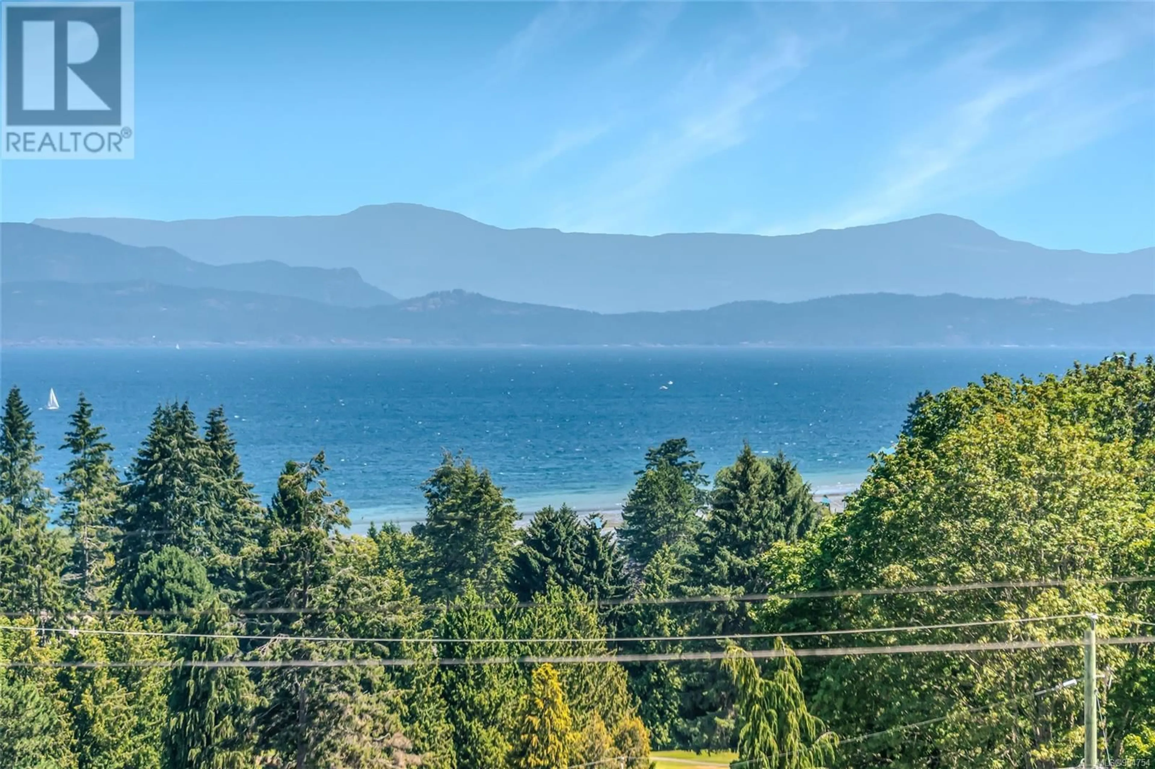 A pic from outside/outdoor area/front of a property/back of a property/a pic from drone, water/lake/river/ocean view for 579 Beach Rd, Qualicum Beach British Columbia V9K1K7