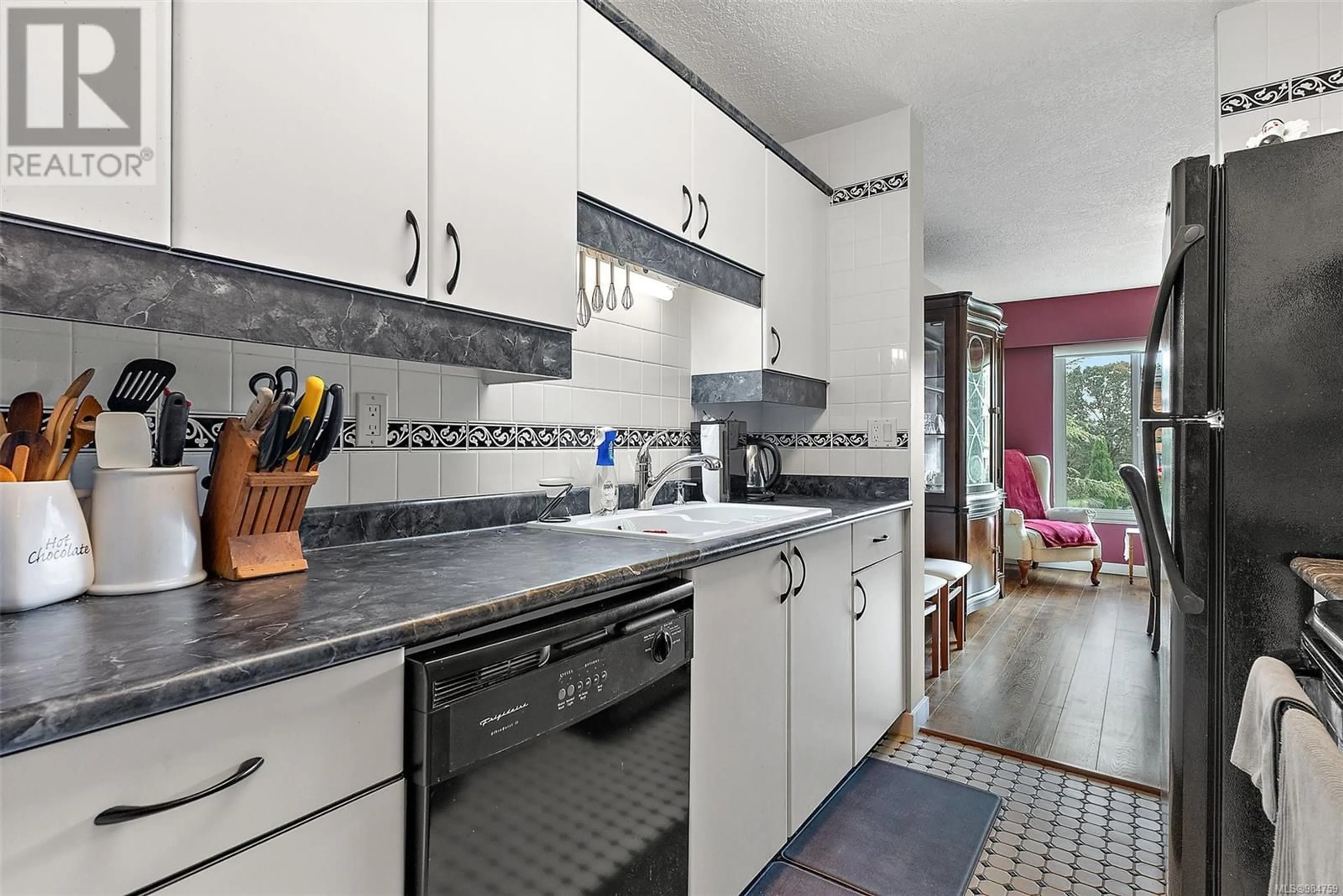 Standard kitchen, ceramic/tile floor for 404 2920 COOK St, Victoria British Columbia V8T3S7