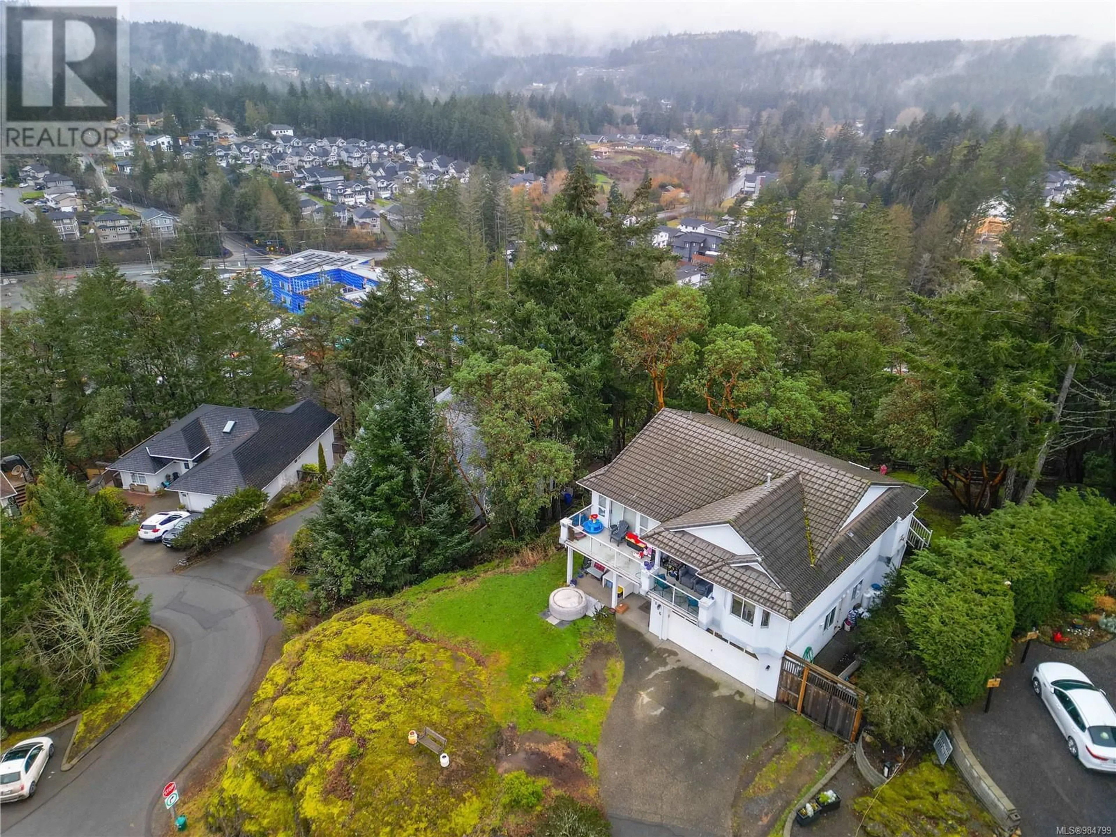 A pic from outside/outdoor area/front of a property/back of a property/a pic from drone, mountain view for 1116 Monica Terr, Langford British Columbia V9C3V2