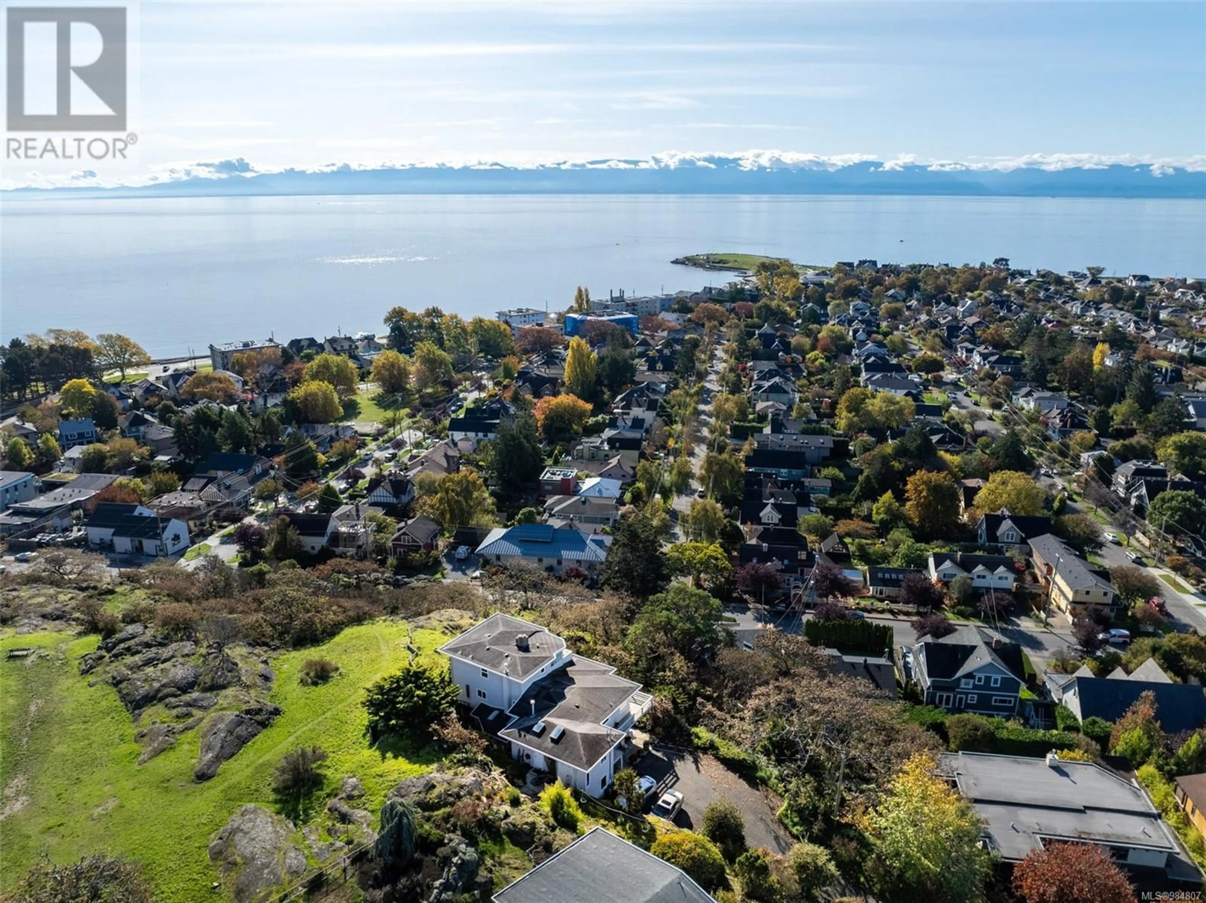 A pic from outside/outdoor area/front of a property/back of a property/a pic from drone, water/lake/river/ocean view for 1357 Bond St, Victoria British Columbia V8W2M6