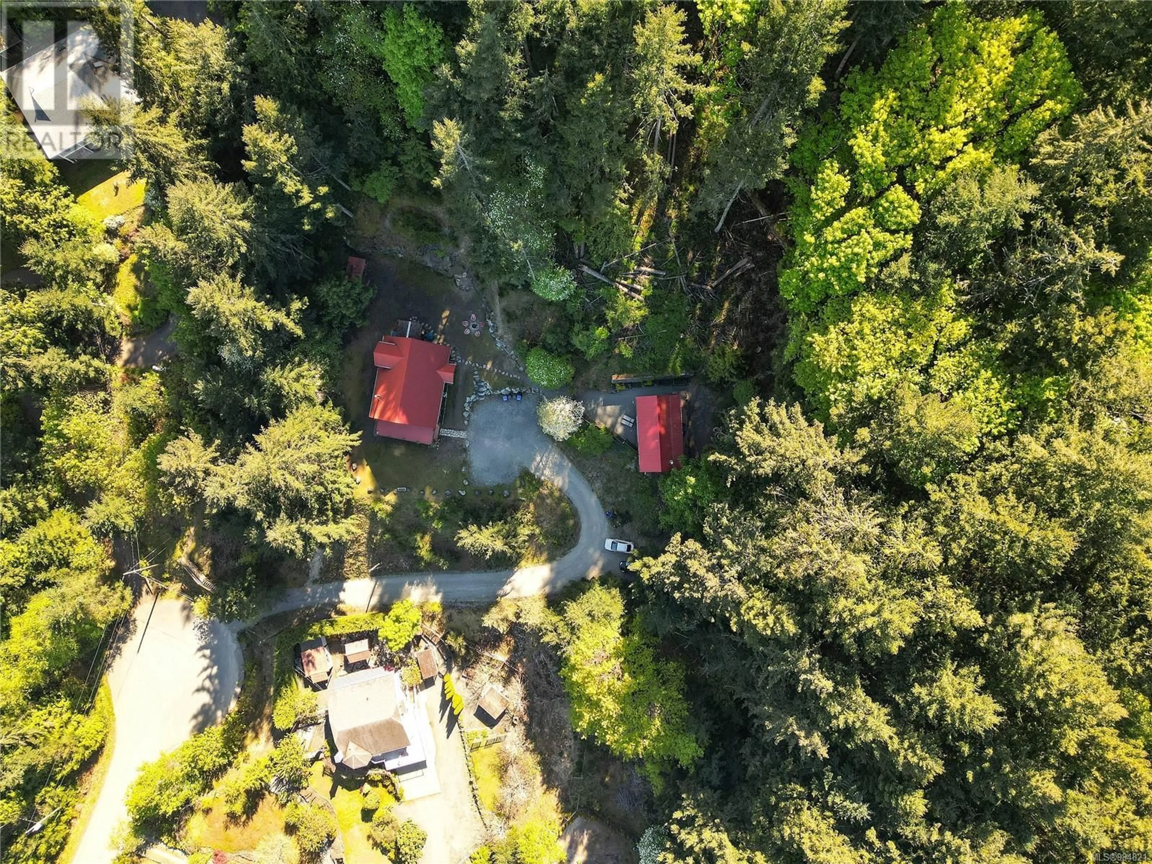 A pic from outside/outdoor area/front of a property/back of a property/a pic from drone, forest/trees view for 1109 / 1111 PARADISE Close, Cowichan Bay British Columbia V0R1N2