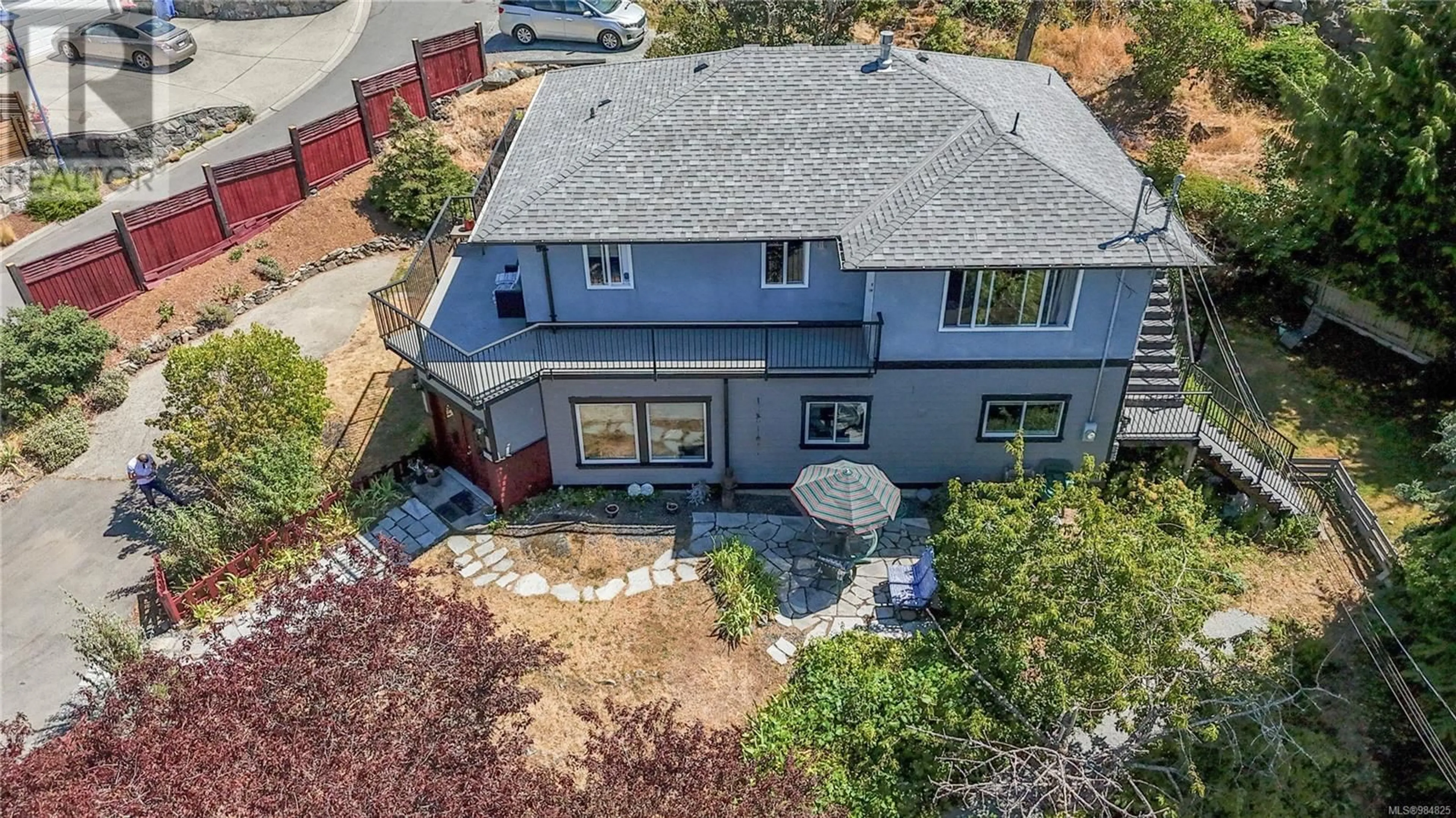 A pic from outside/outdoor area/front of a property/back of a property/a pic from drone, street for 660 Rockingham Rd, Langford British Columbia V9B3N8