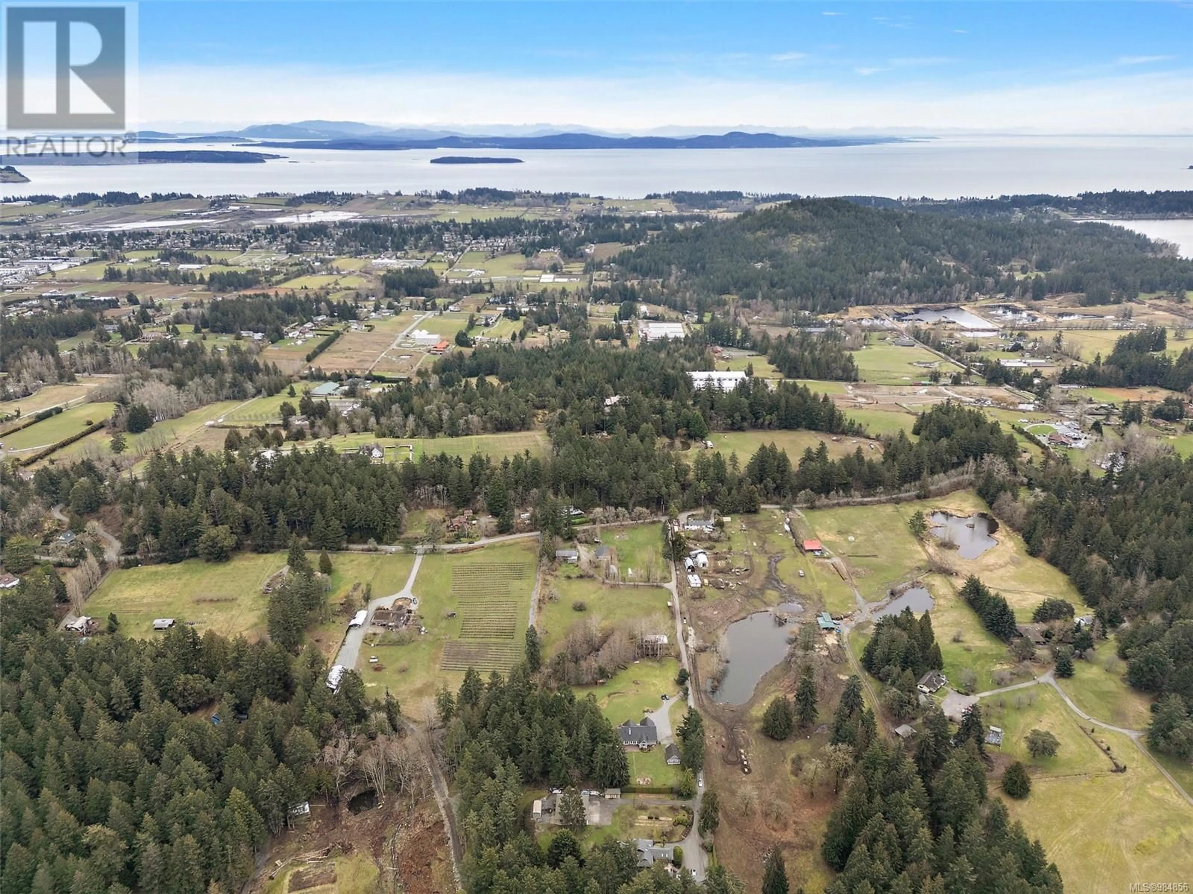 A pic from outside/outdoor area/front of a property/back of a property/a pic from drone, water/lake/river/ocean view for 6090 Old West Saanich Rd, Saanich British Columbia V9E2G8