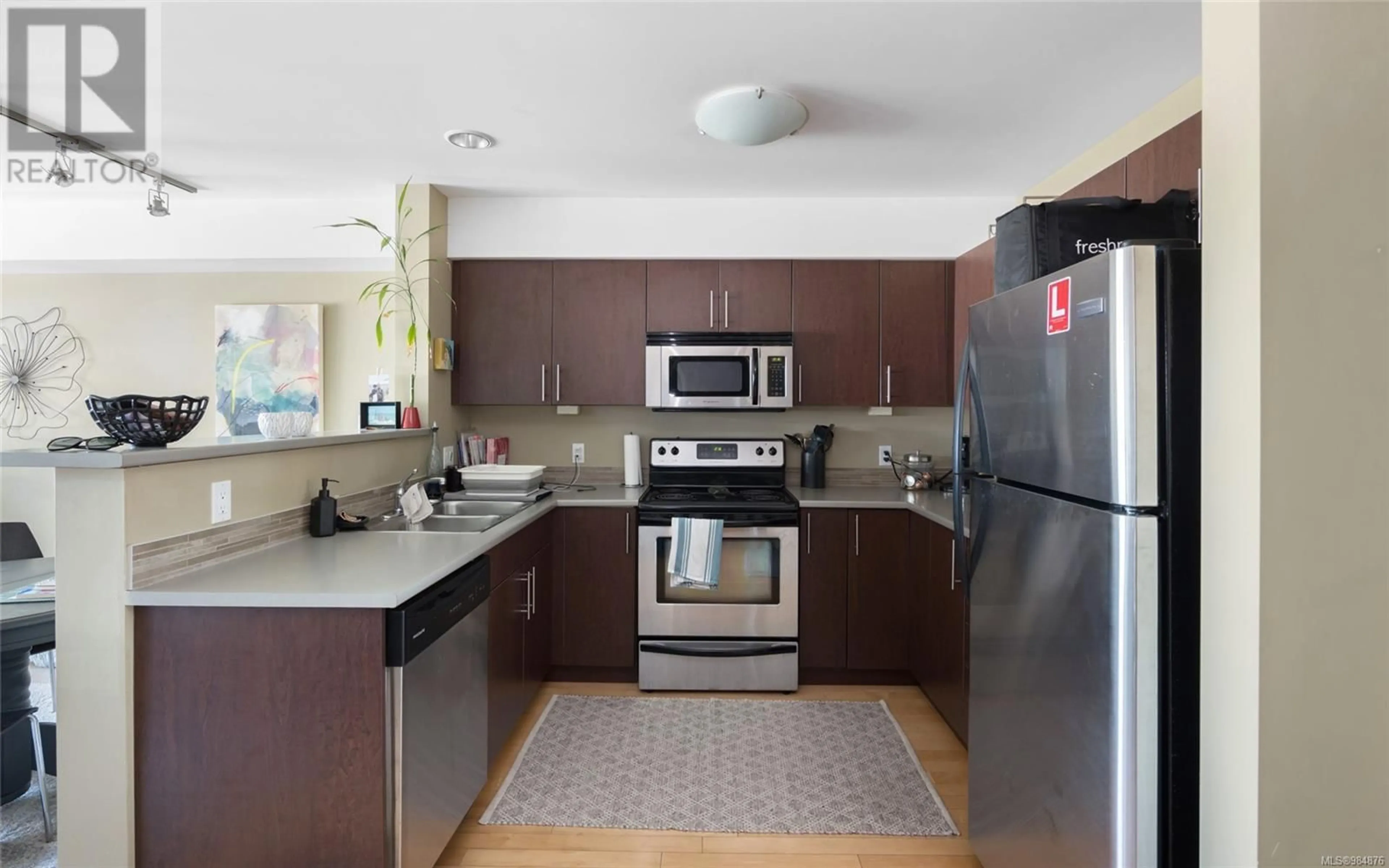 Standard kitchen, ceramic/tile floor for 309 797 Tyee Rd, Victoria British Columbia V9A7R4