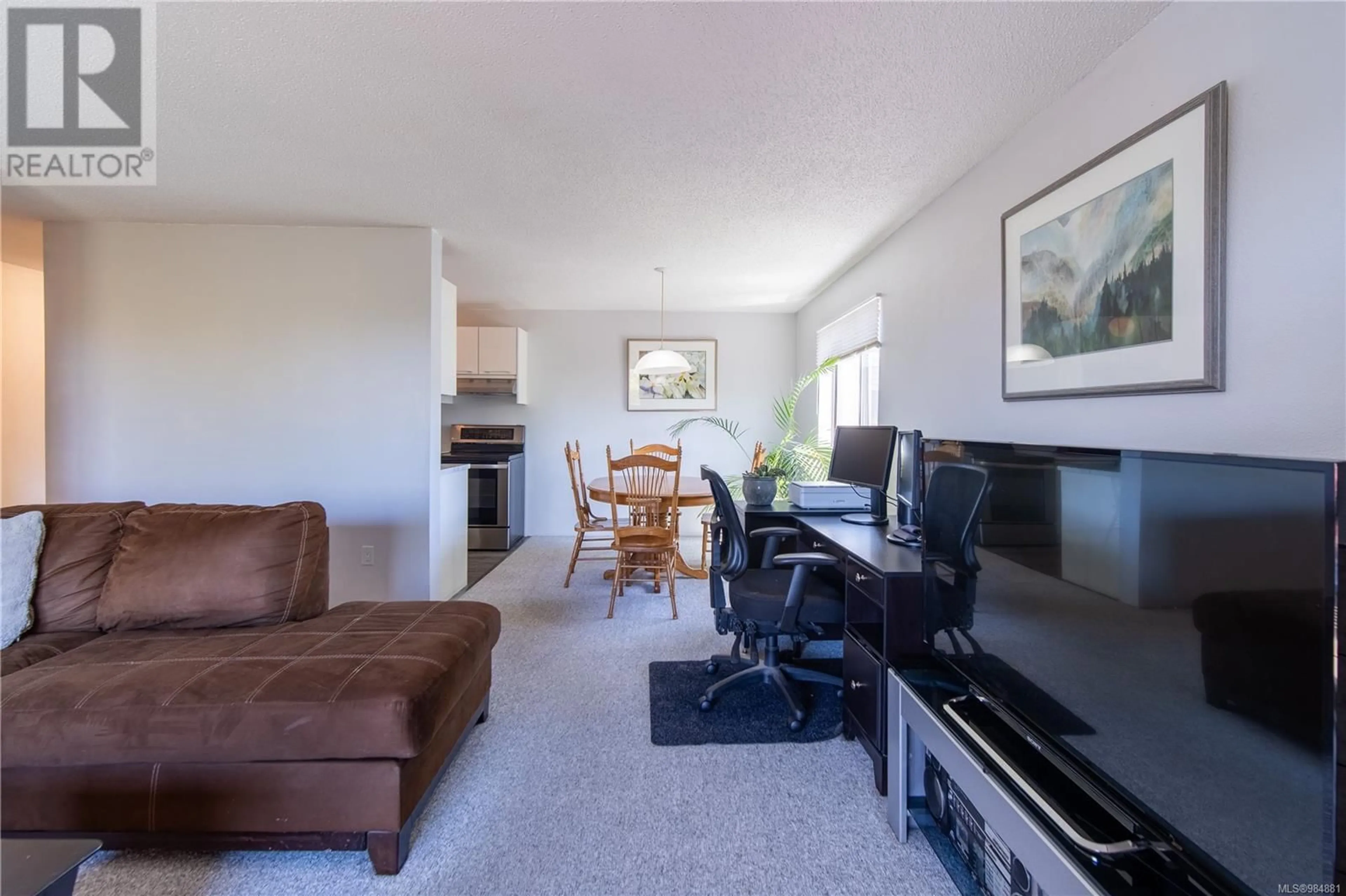 Living room with furniture, unknown for 421 3255 Glasgow Ave, Saanich British Columbia V8X4S4