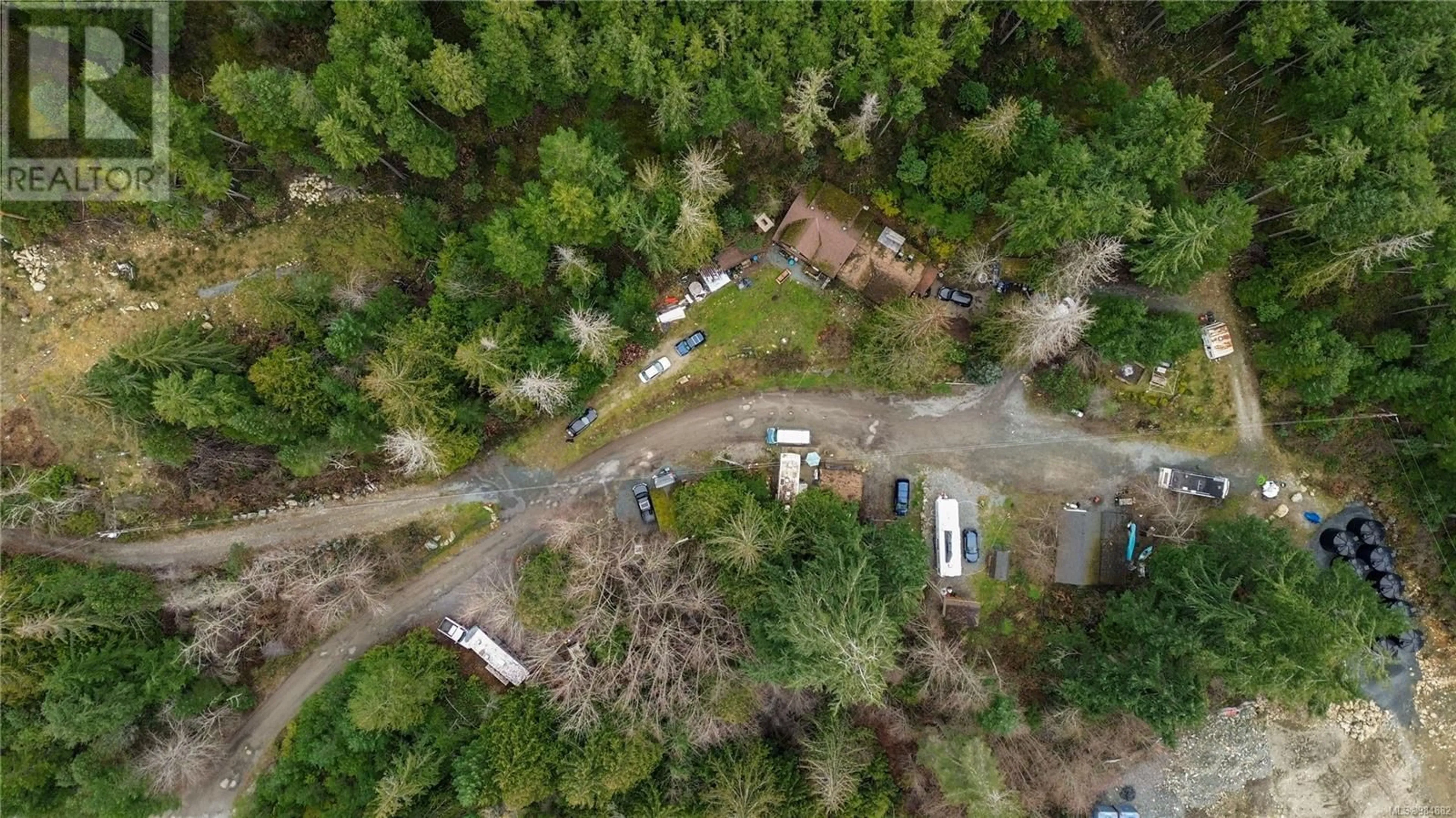 A pic from outside/outdoor area/front of a property/back of a property/a pic from drone, forest/trees view for 687-689 Shawnigan Lake Rd, Shawnigan Lake British Columbia V0R2L0