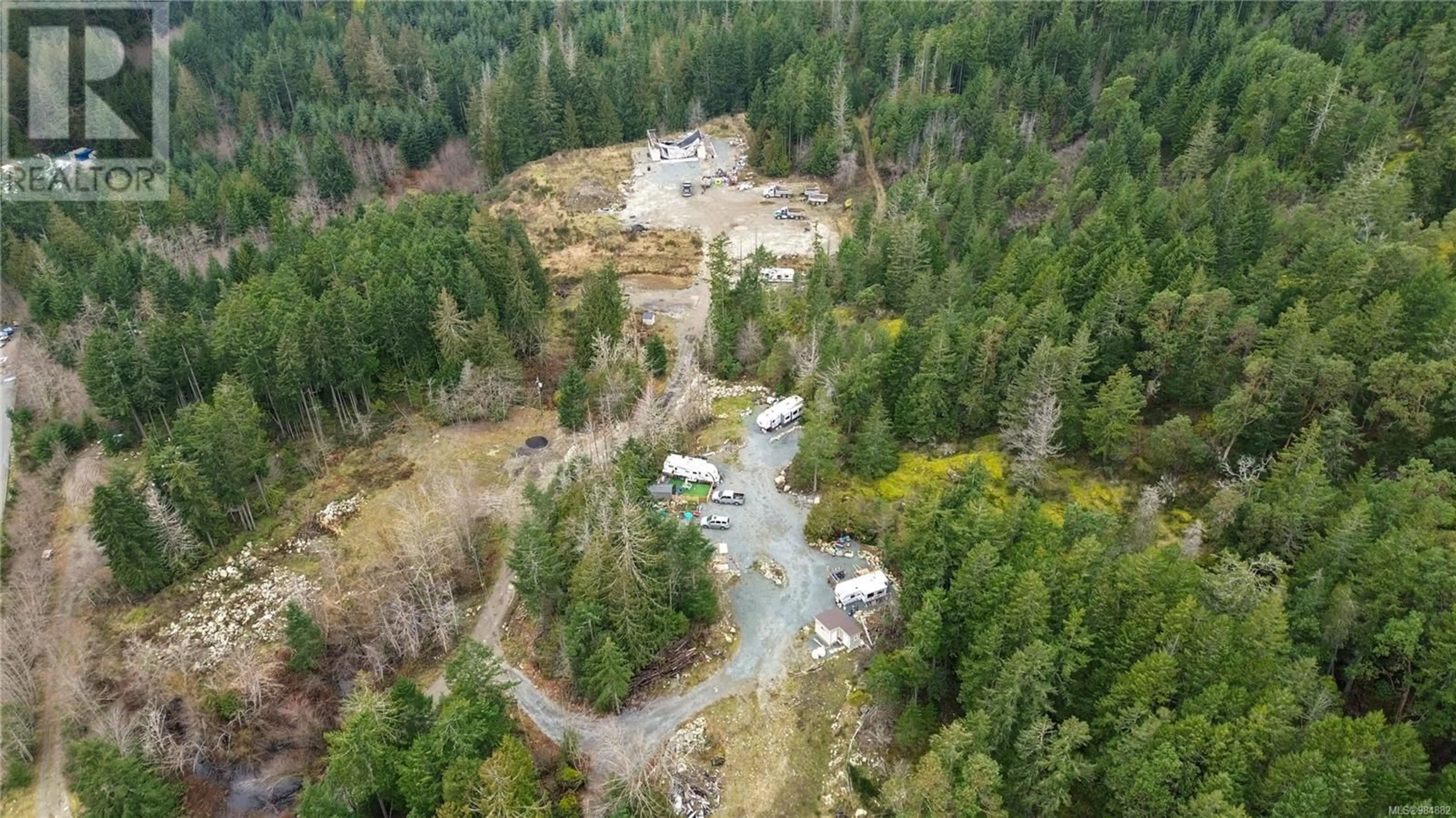 A pic from outside/outdoor area/front of a property/back of a property/a pic from drone, forest/trees view for 687-689 Shawnigan Lake Rd, Shawnigan Lake British Columbia V0R2L0