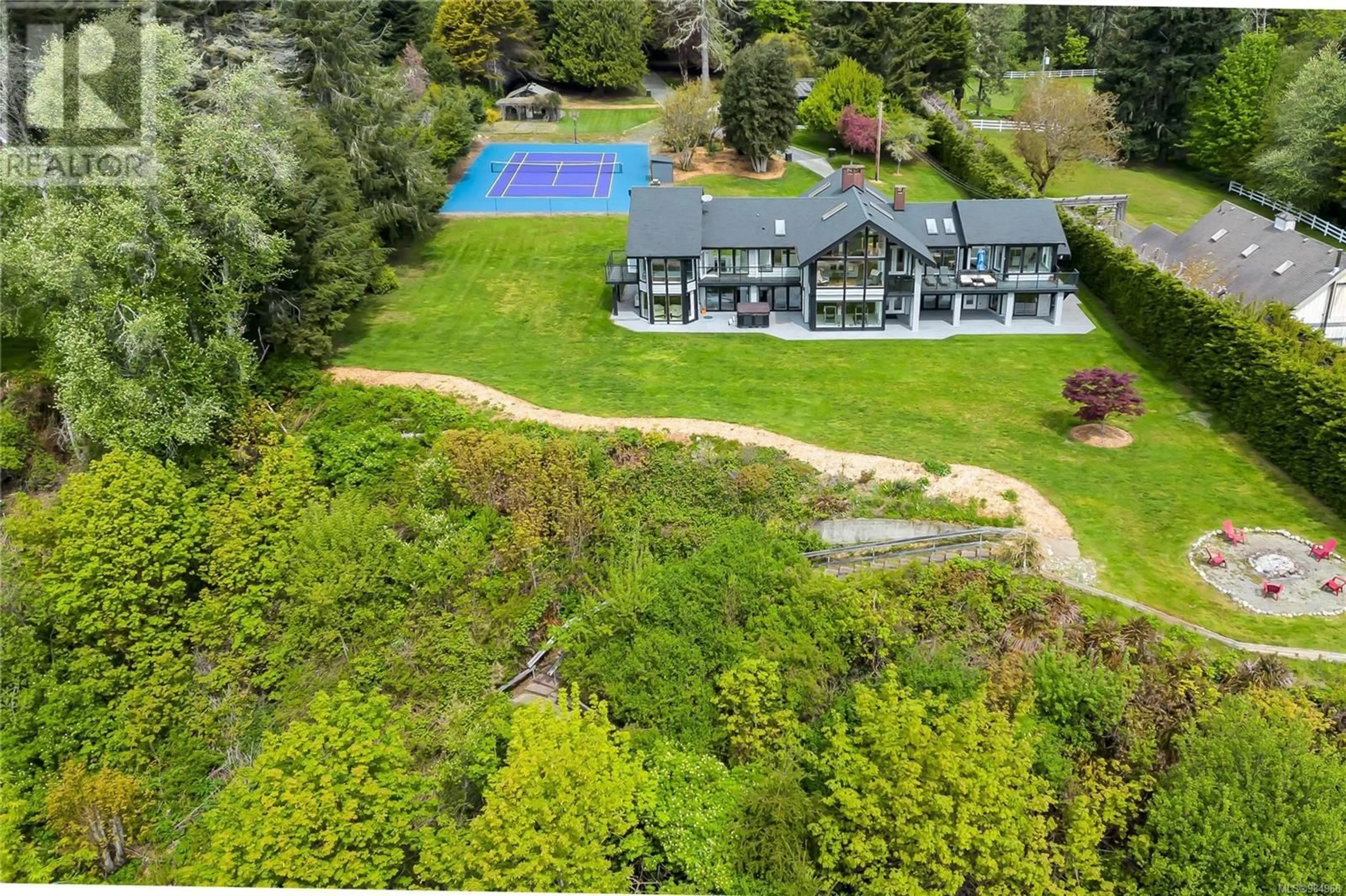 A pic from outside/outdoor area/front of a property/back of a property/a pic from drone, water/lake/river/ocean view for 9227 Invermuir Rd, Sooke British Columbia V9Z1G3