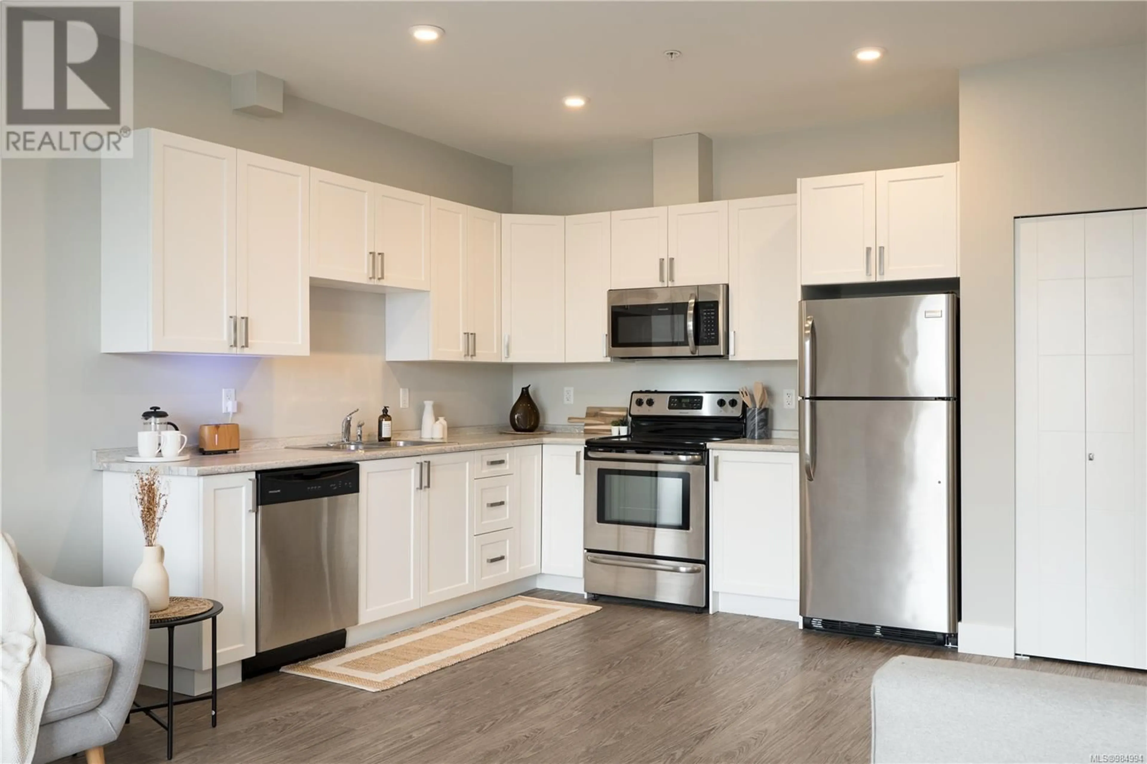 Open concept kitchen, unknown for 203 1847 Dufferin Cres, Nanaimo British Columbia V9S0B1