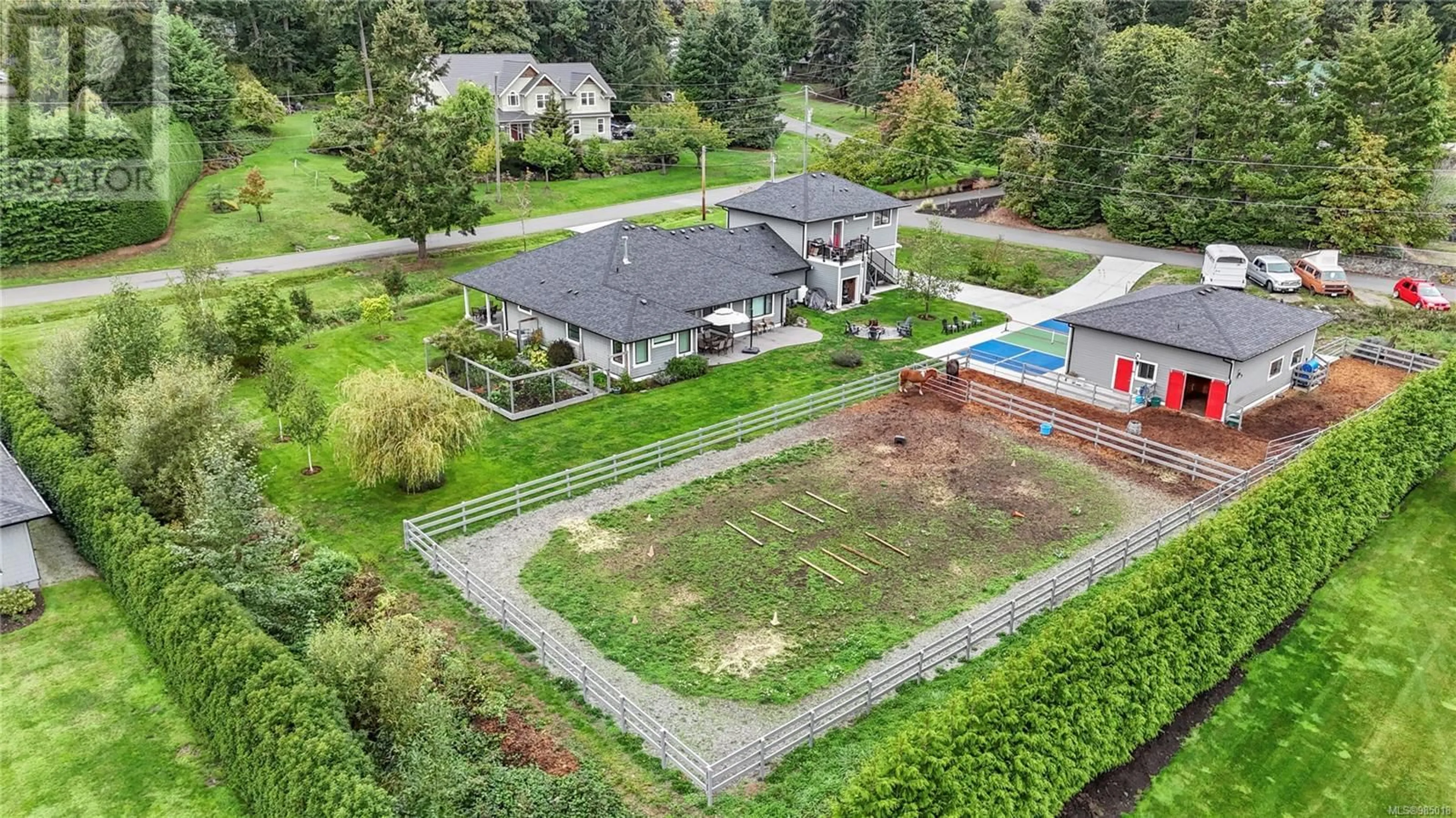 A pic from outside/outdoor area/front of a property/back of a property/a pic from drone, street for 11329 Hummingbird Pl, North Saanich British Columbia V8L5S3