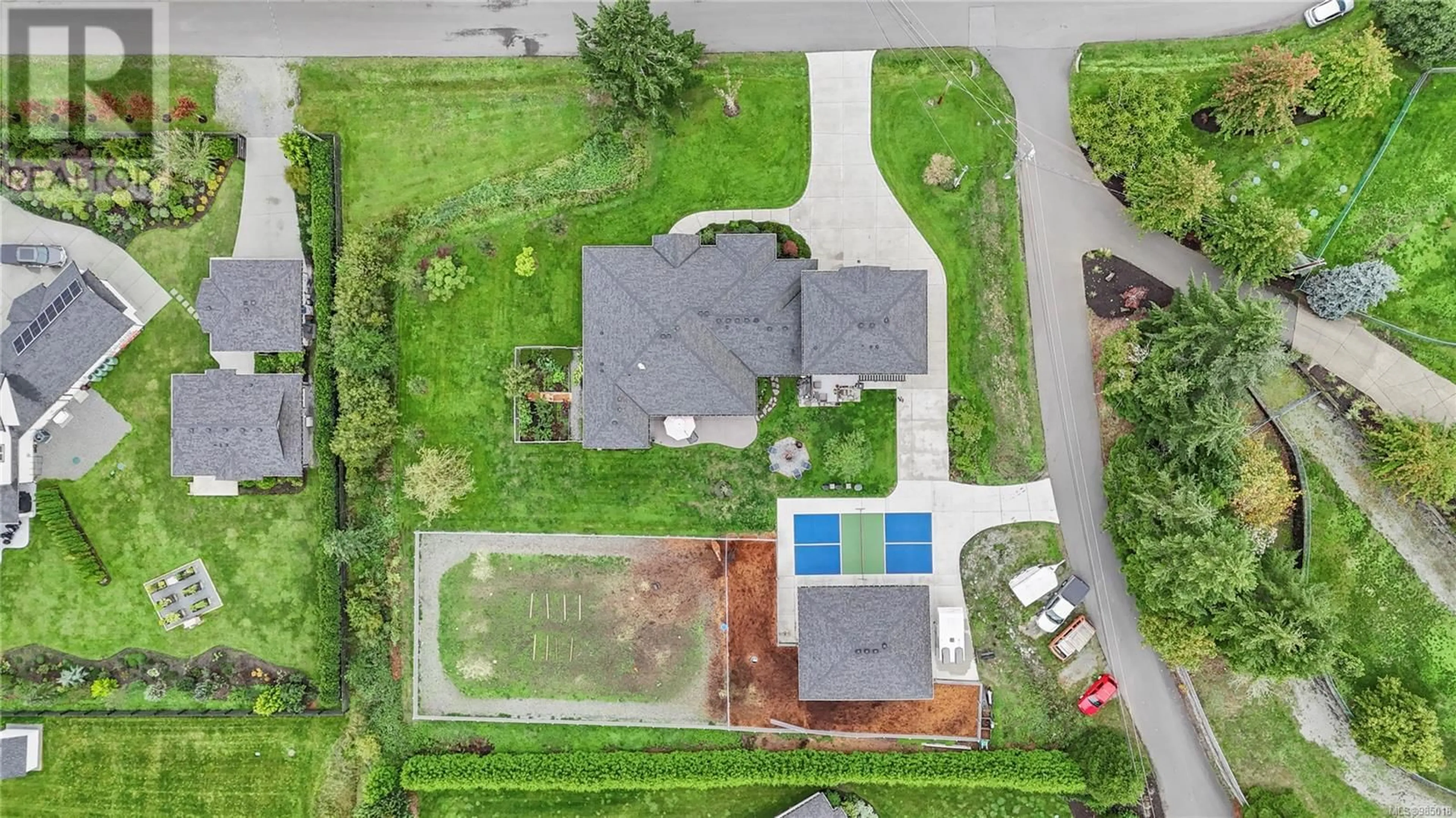 A pic from outside/outdoor area/front of a property/back of a property/a pic from drone, street for 11329 Hummingbird Pl, North Saanich British Columbia V8L5S3