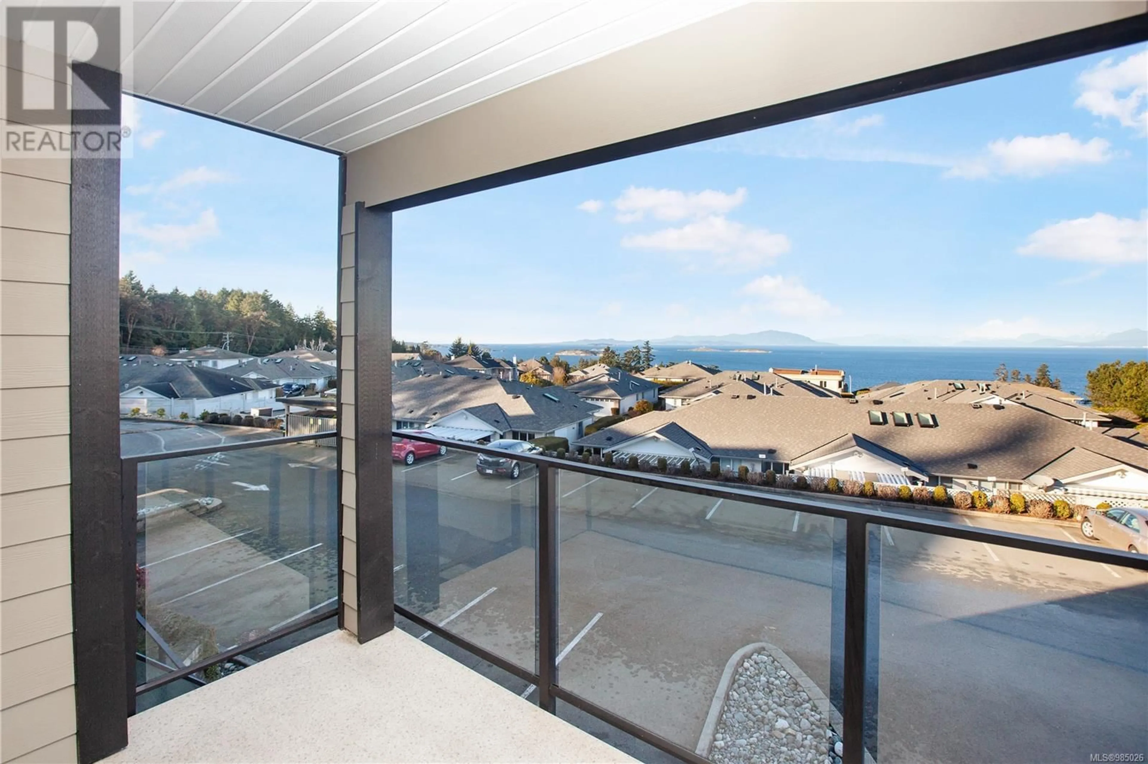 Balcony in the apartment, water/lake/river/ocean view for 204 6728 Dickinson Rd, Nanaimo British Columbia V9V1T3