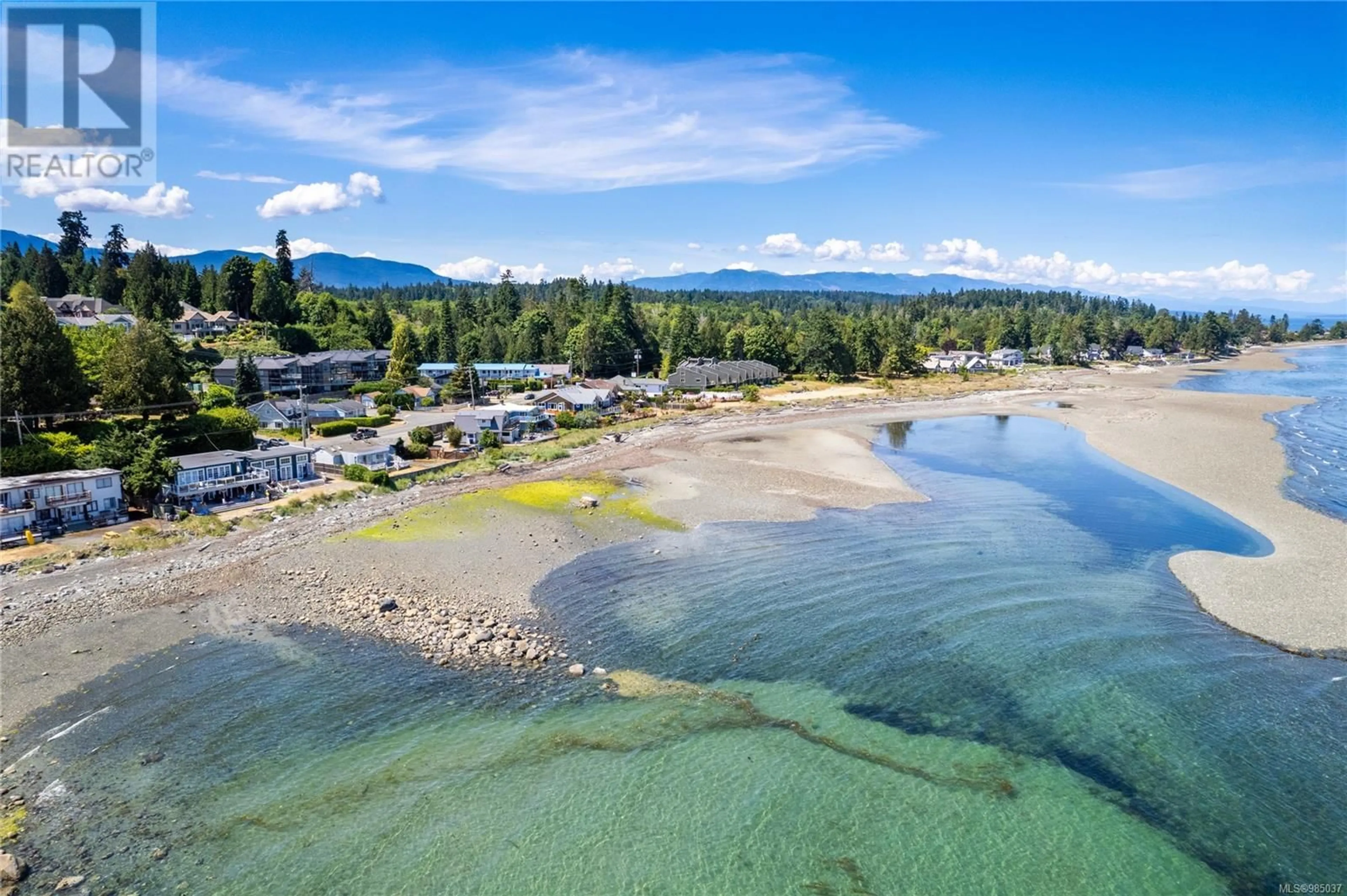 A pic from outside/outdoor area/front of a property/back of a property/a pic from drone, water/lake/river/ocean view for 3257 Island Hwy, Qualicum Beach British Columbia V9K2C6