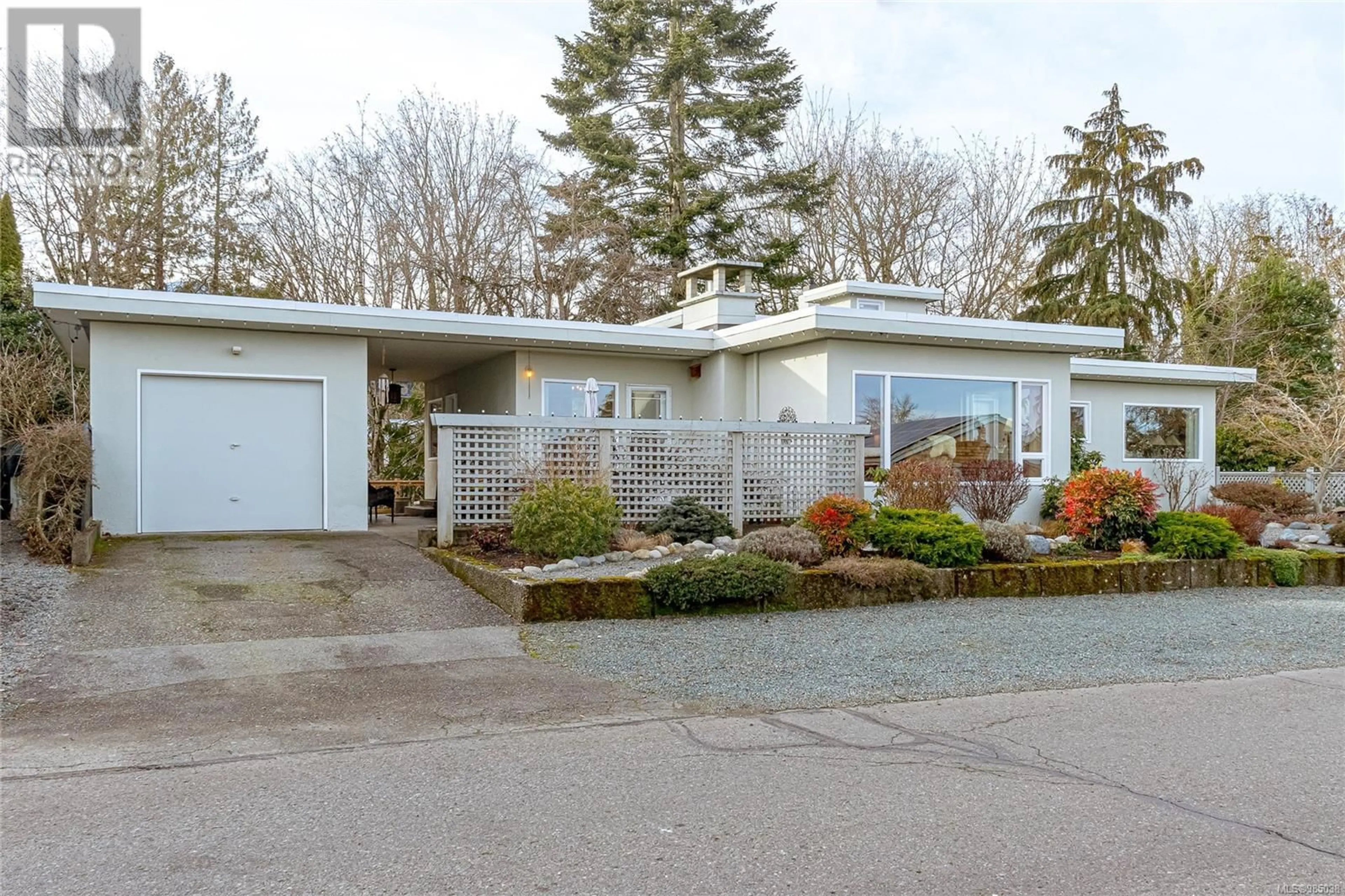 Home with vinyl exterior material, street for 10026 Beach Dr, Chemainus British Columbia V0R1K1