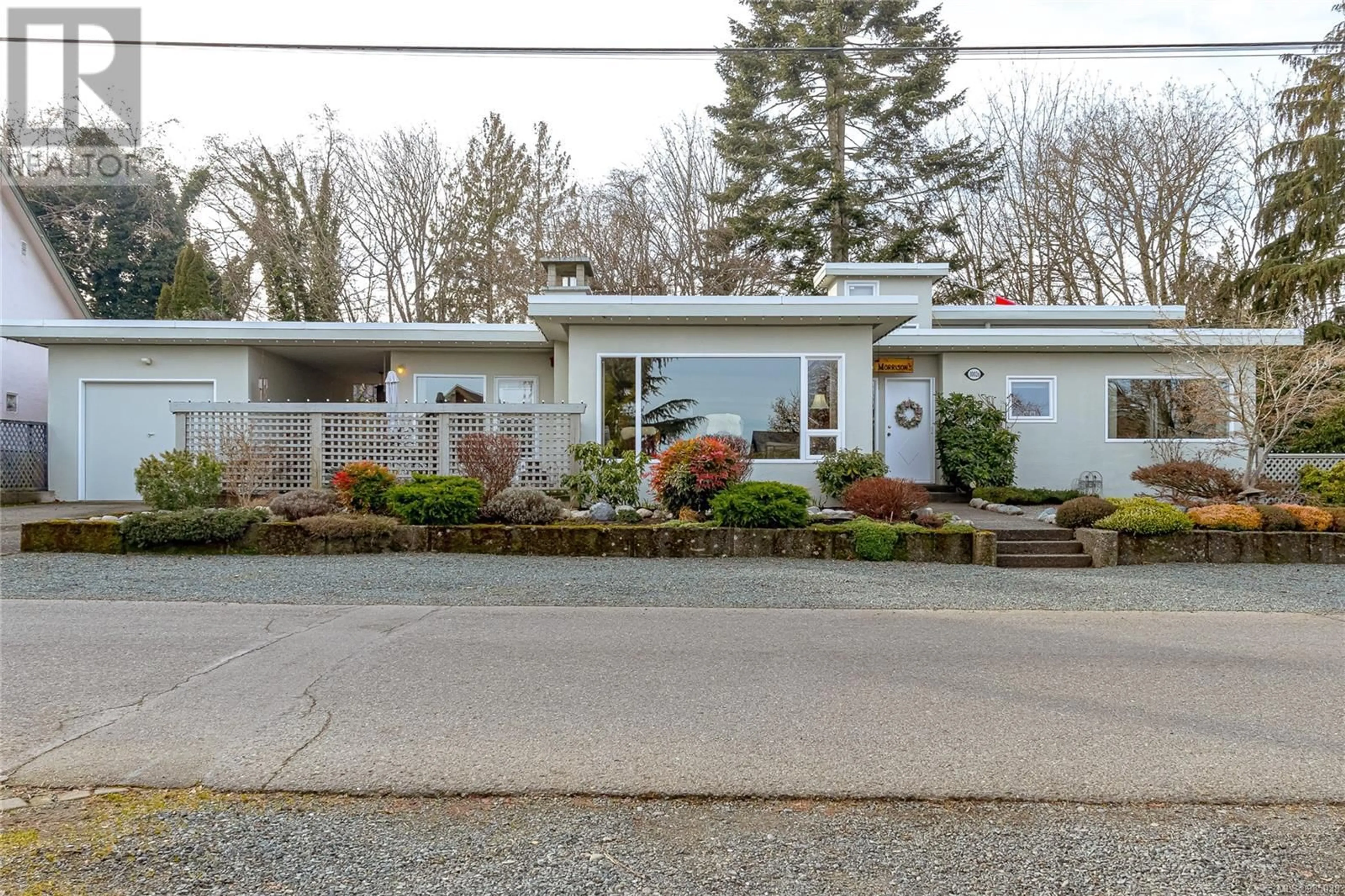 Home with vinyl exterior material, street for 10026 Beach Dr, Chemainus British Columbia V0R1K1