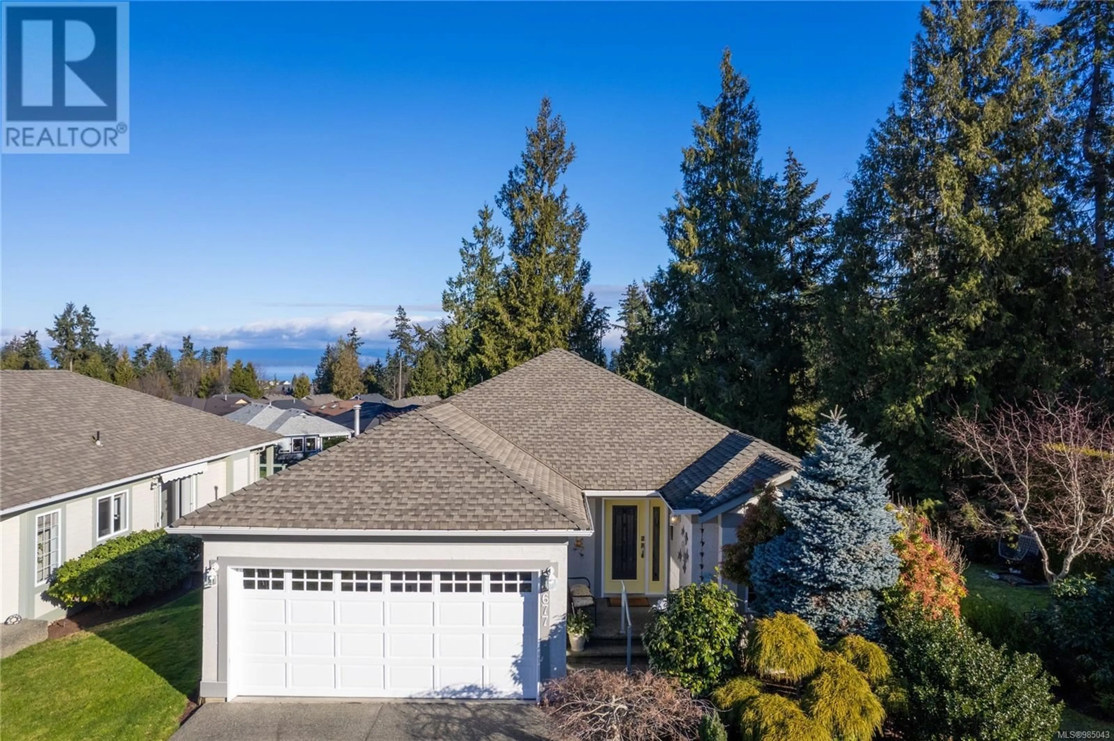 A pic from outside/outdoor area/front of a property/back of a property/a pic from drone, water/lake/river/ocean view for 677 Windward Way, Qualicum Beach British Columbia V9K2K4