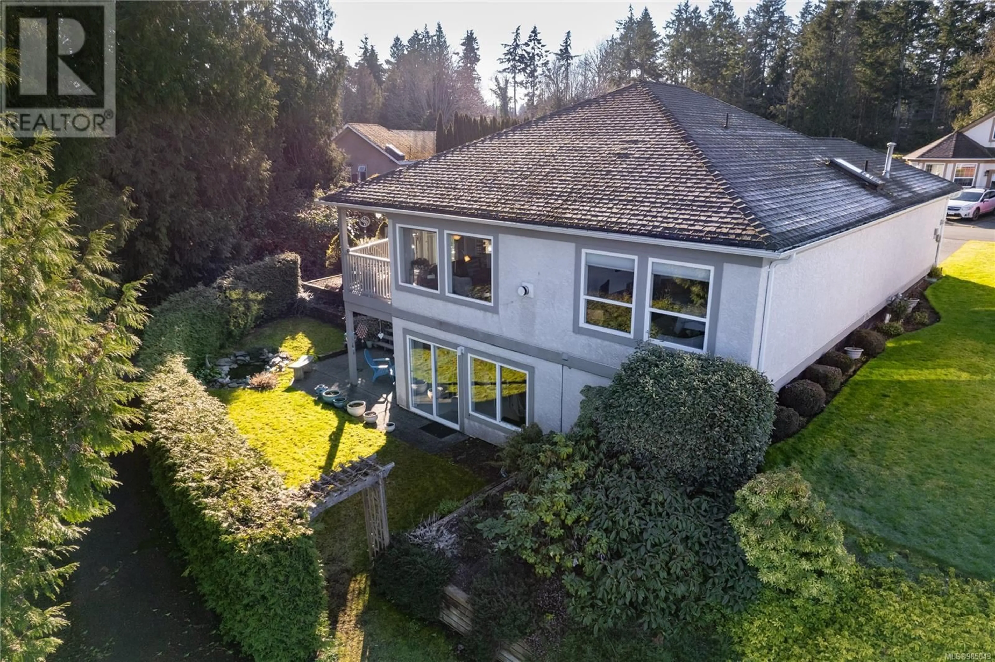 A pic from outside/outdoor area/front of a property/back of a property/a pic from drone, unknown for 677 Windward Way, Qualicum Beach British Columbia V9K2K4