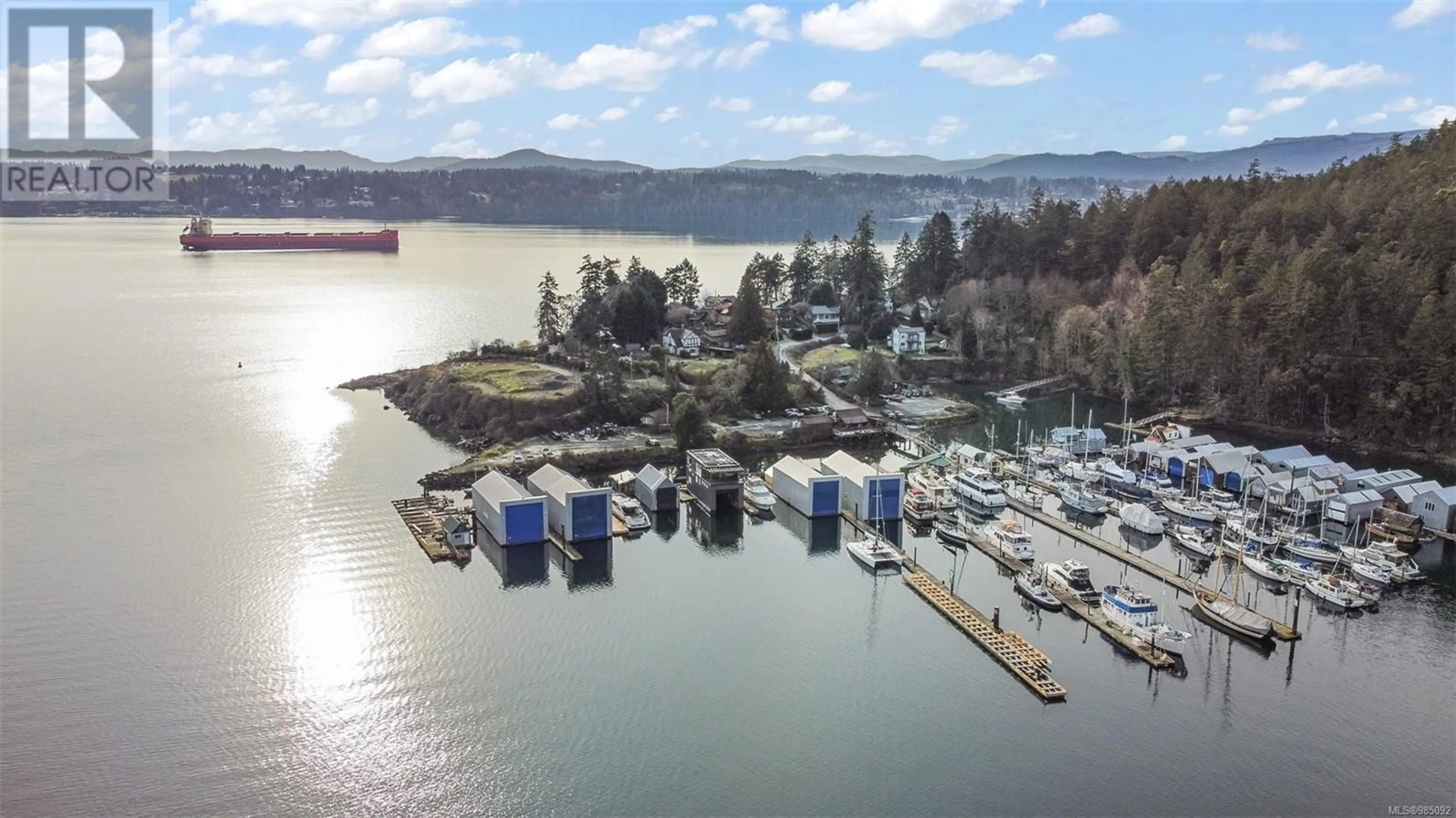 A pic from outside/outdoor area/front of a property/back of a property/a pic from drone, water/lake/river/ocean view for 5000 Genoa Bay Rd, Duncan British Columbia V9L5Y8