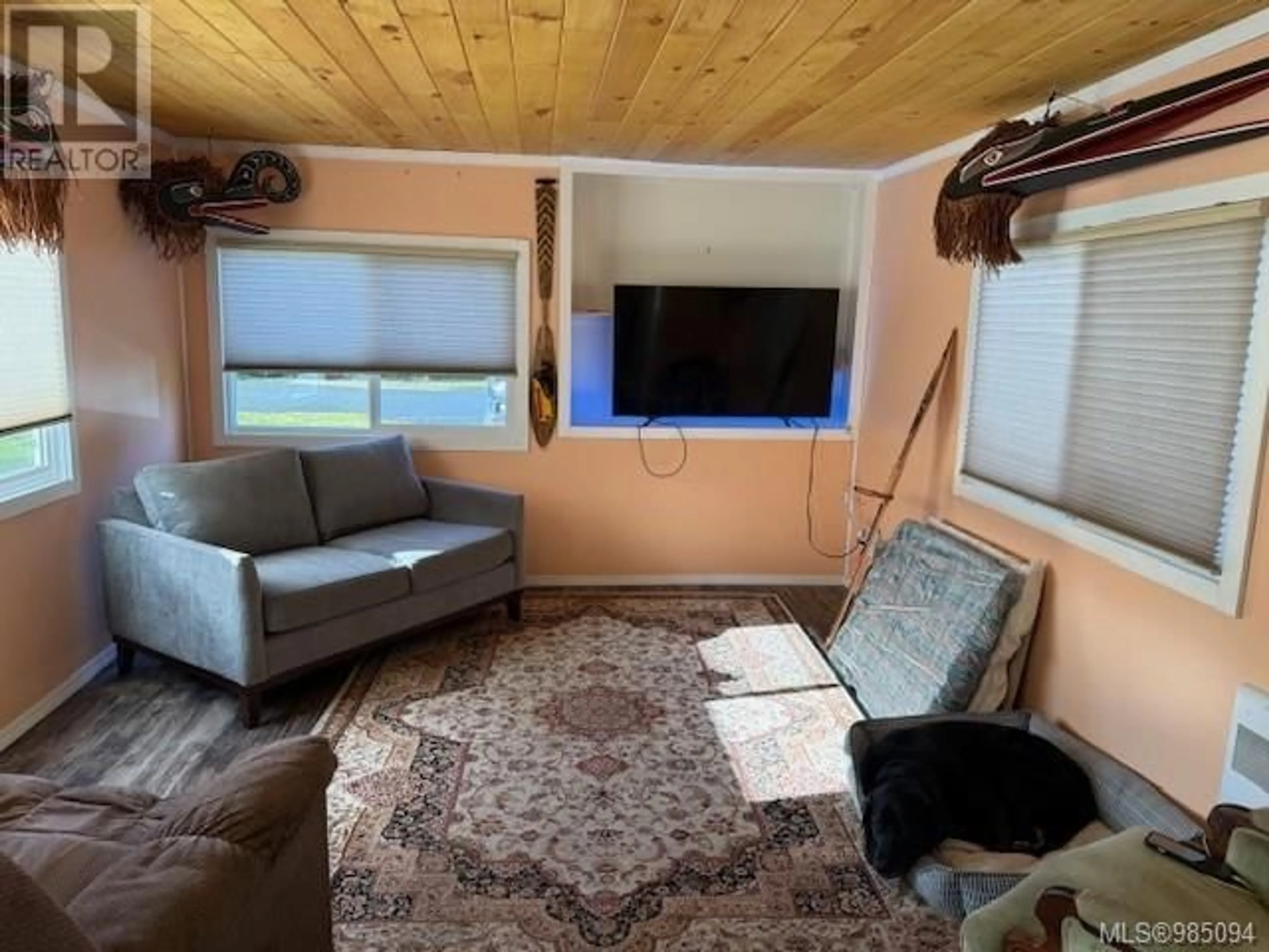 Living room with furniture, wood/laminate floor for 99 7100 highview Dr, Port Hardy British Columbia V0N2P0