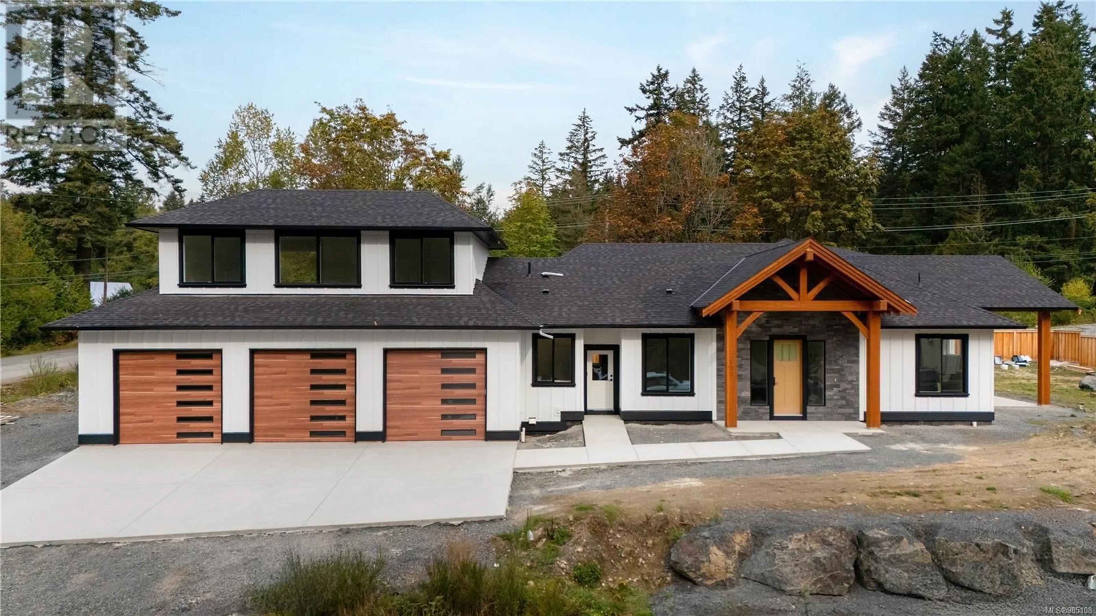 Home with vinyl exterior material, street for 2600 Craven Cres, Mill Bay British Columbia V0R2P2