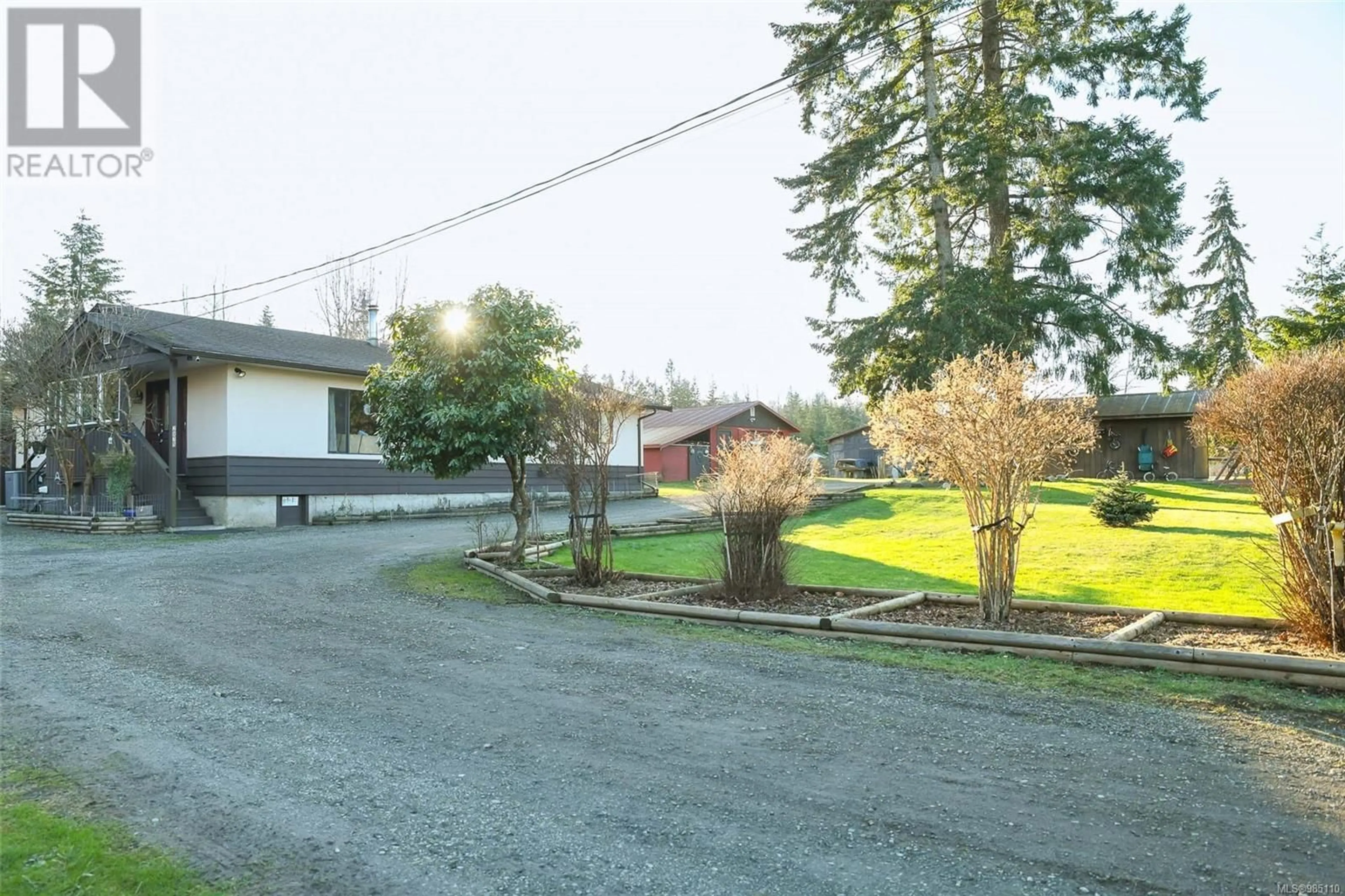 A pic from outside/outdoor area/front of a property/back of a property/a pic from drone, street for 2875 Arden Rd, Courtenay British Columbia V9N9J9