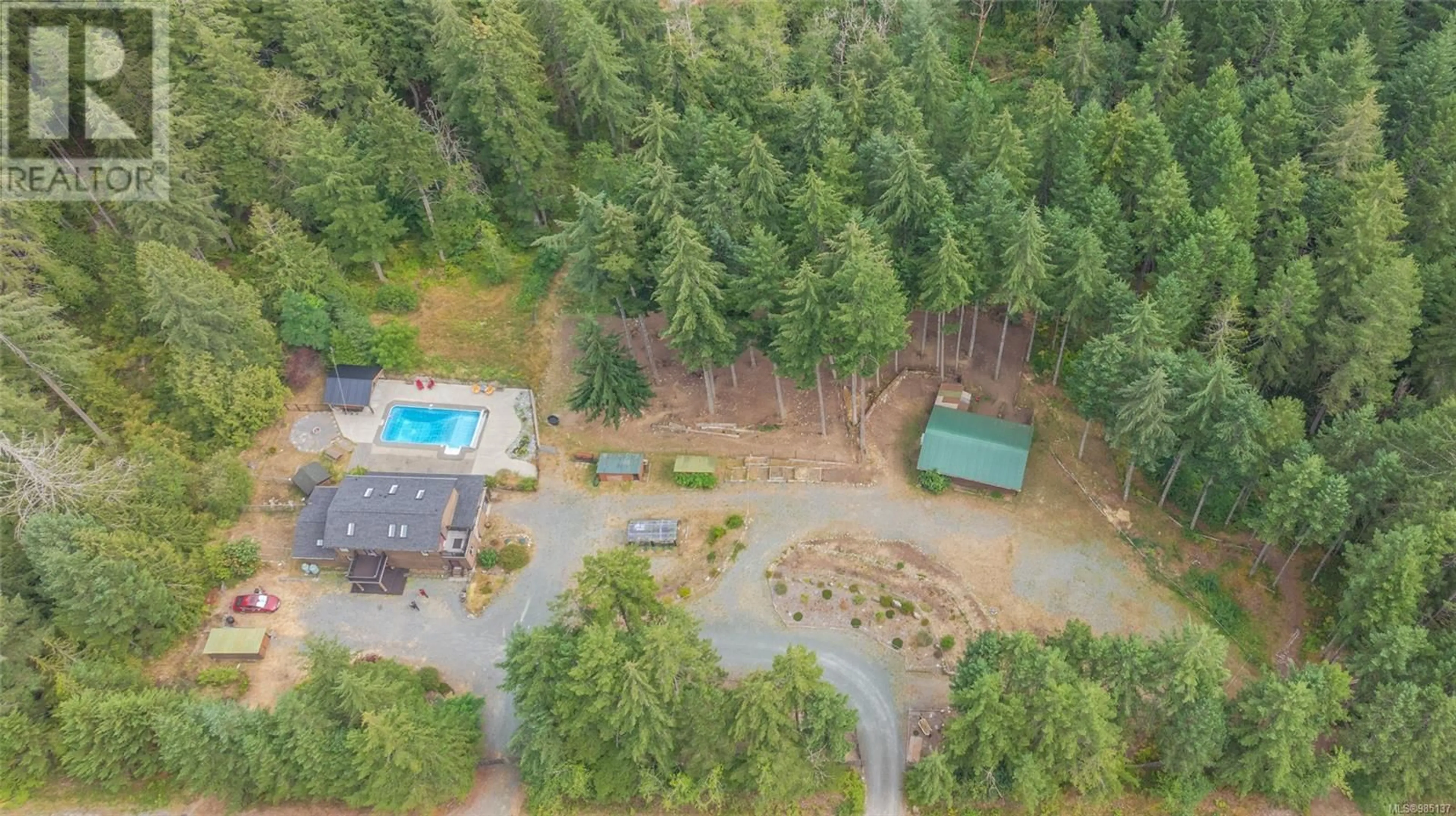 A pic from outside/outdoor area/front of a property/back of a property/a pic from drone, forest/trees view for 6143 Lepage Rd, Duncan British Columbia V9L6H7