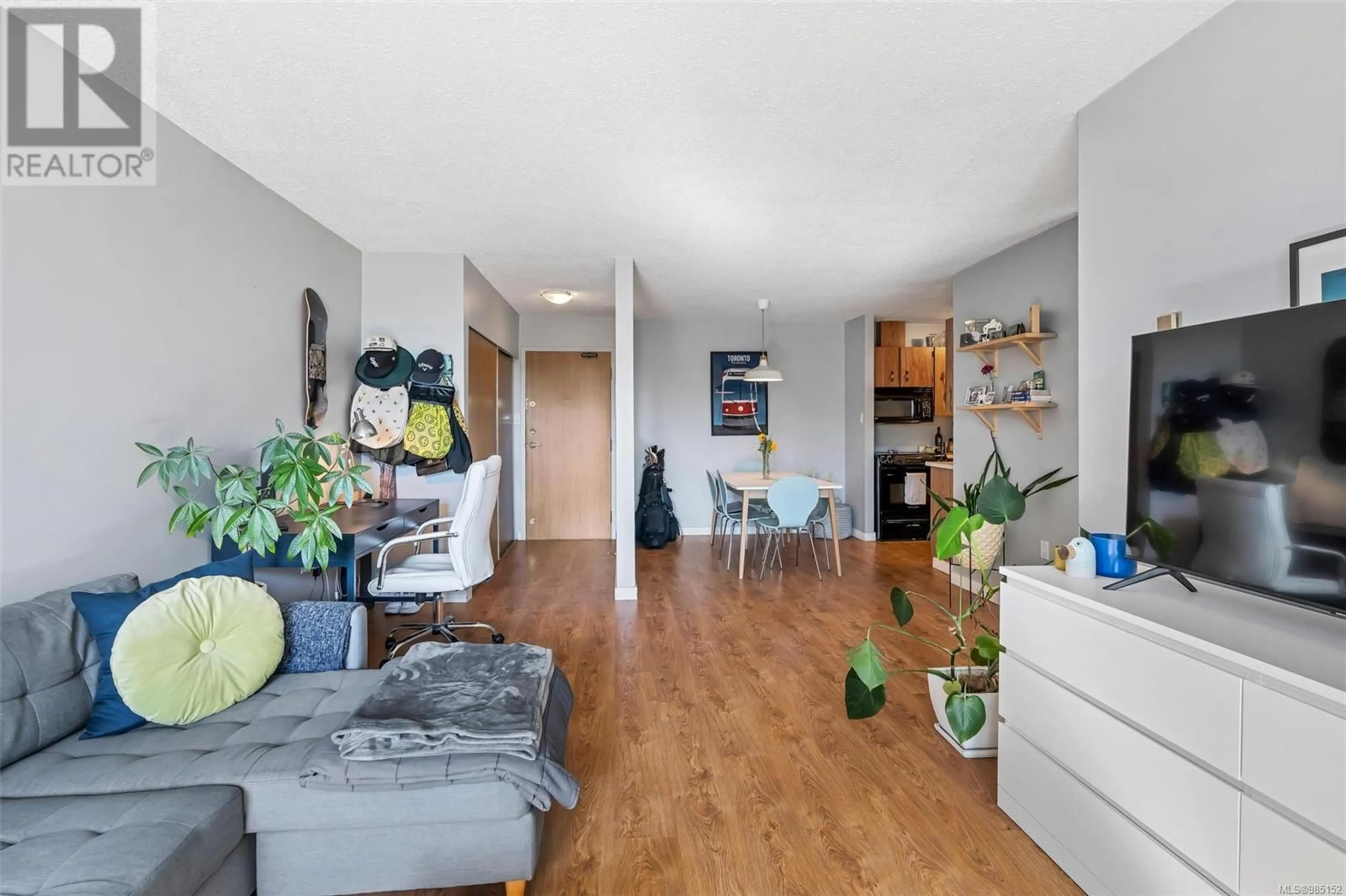 Living room with furniture, wood/laminate floor for 414 1745 Leighton Rd, Victoria British Columbia V8R6R6