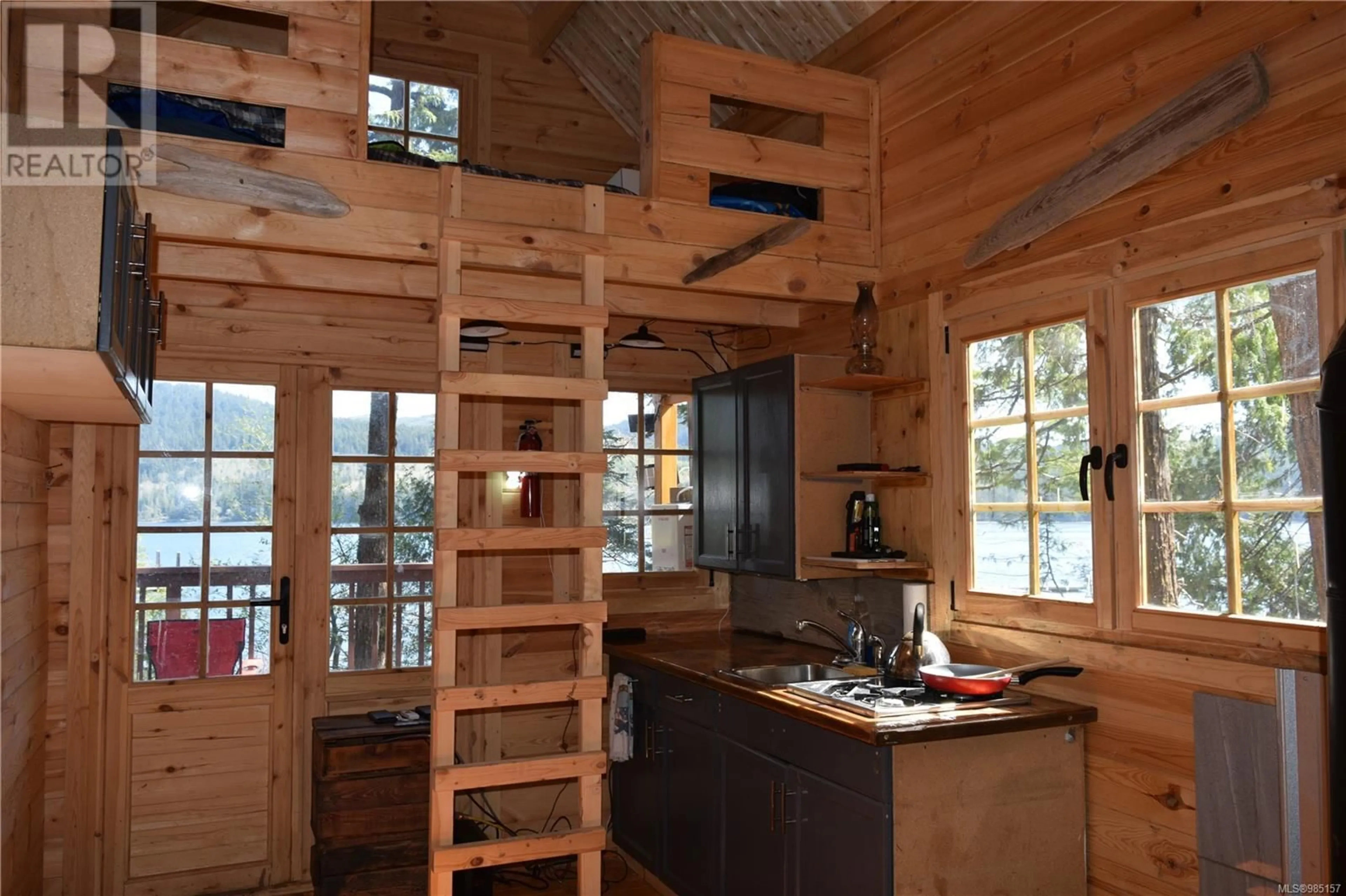 Rustic kitchen, wood/laminate floor for LT 11 308 Winter Harbour Rd, Winter Harbour British Columbia V0N3L0