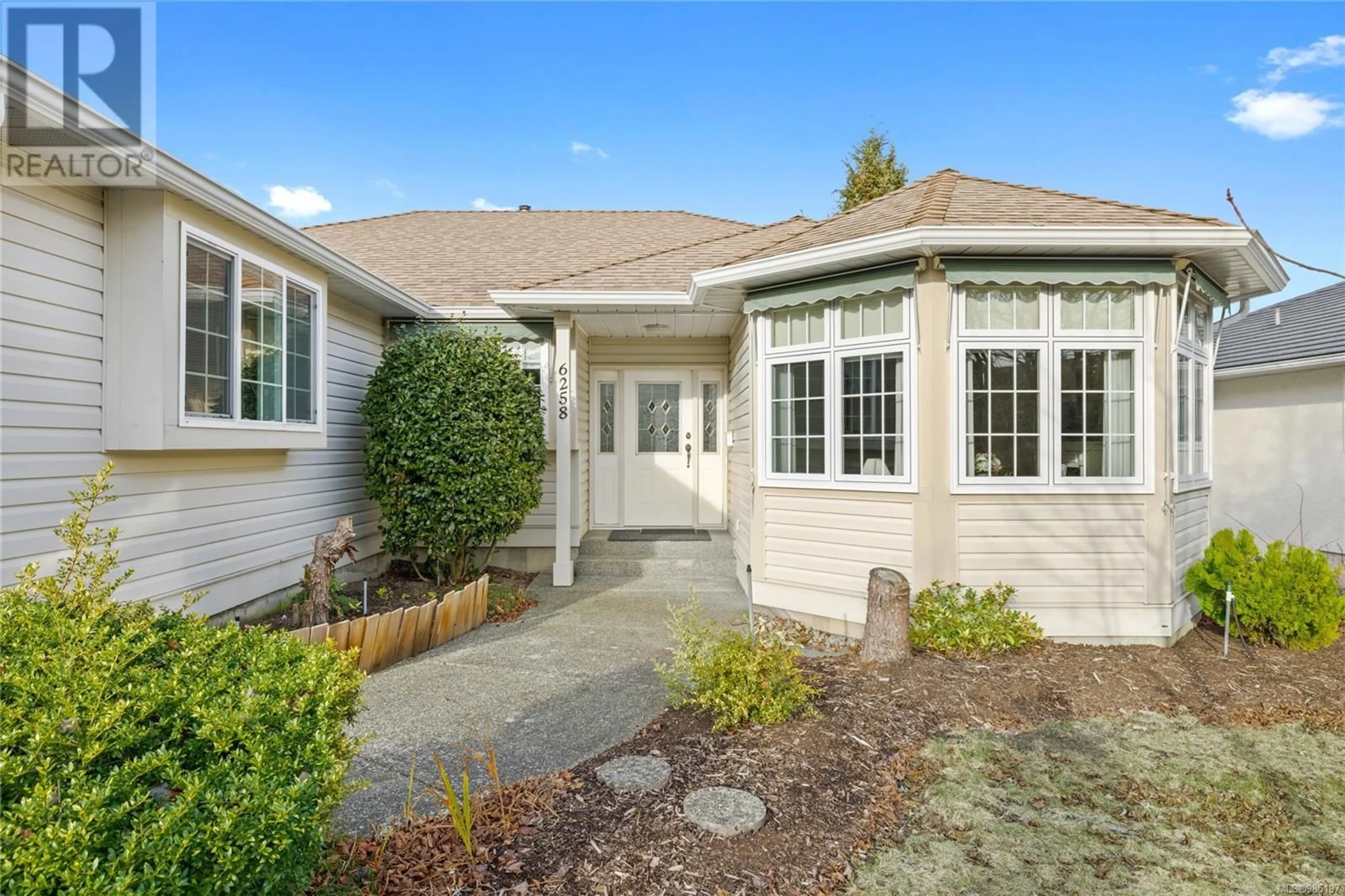 Home with vinyl exterior material, street for 6258 Waterbury Rd, Nanaimo British Columbia V9V1L5