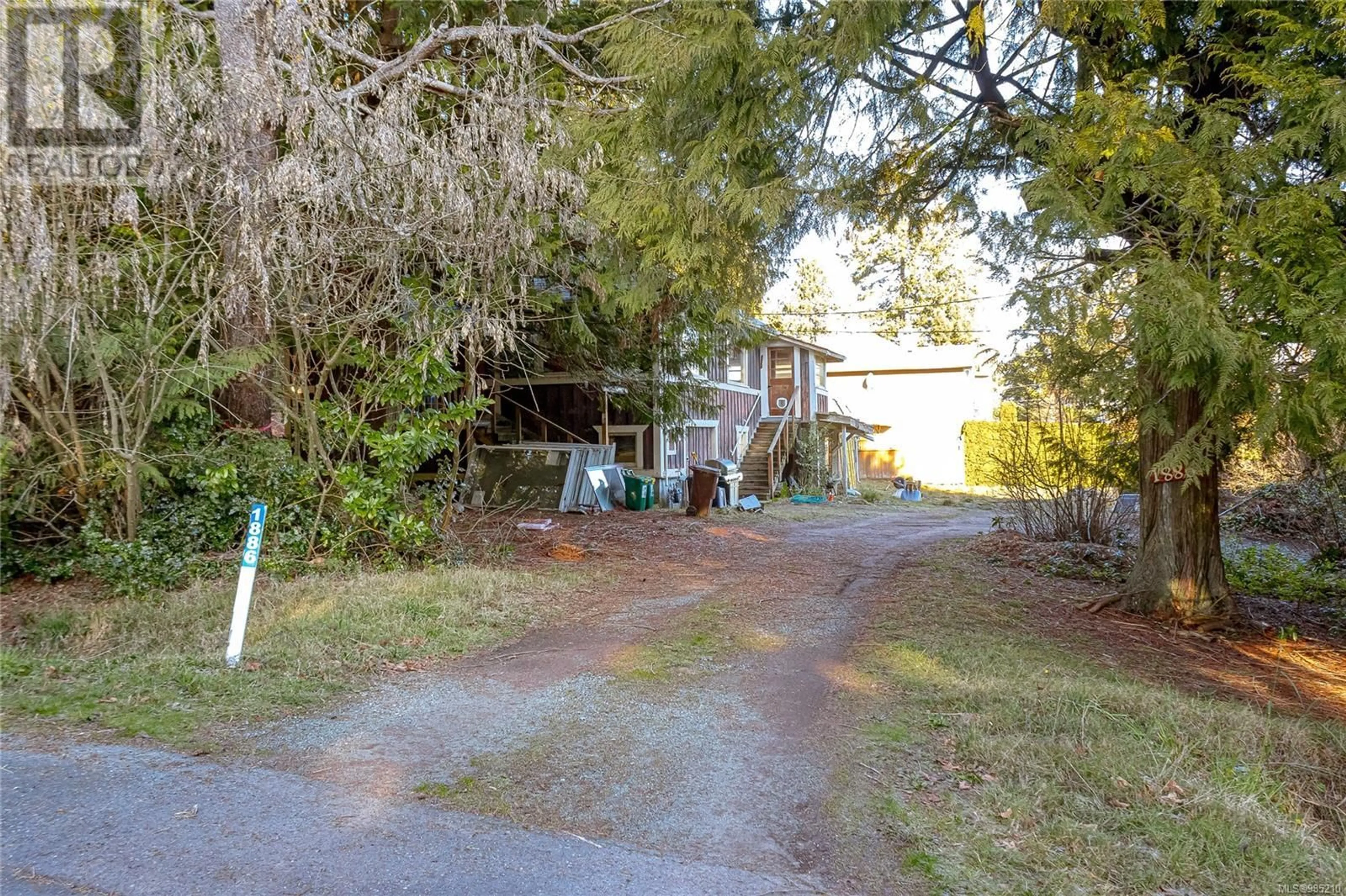 A pic from outside/outdoor area/front of a property/back of a property/a pic from drone, street for 1886 Dean Park Rd, North Saanich British Columbia V8L1C1