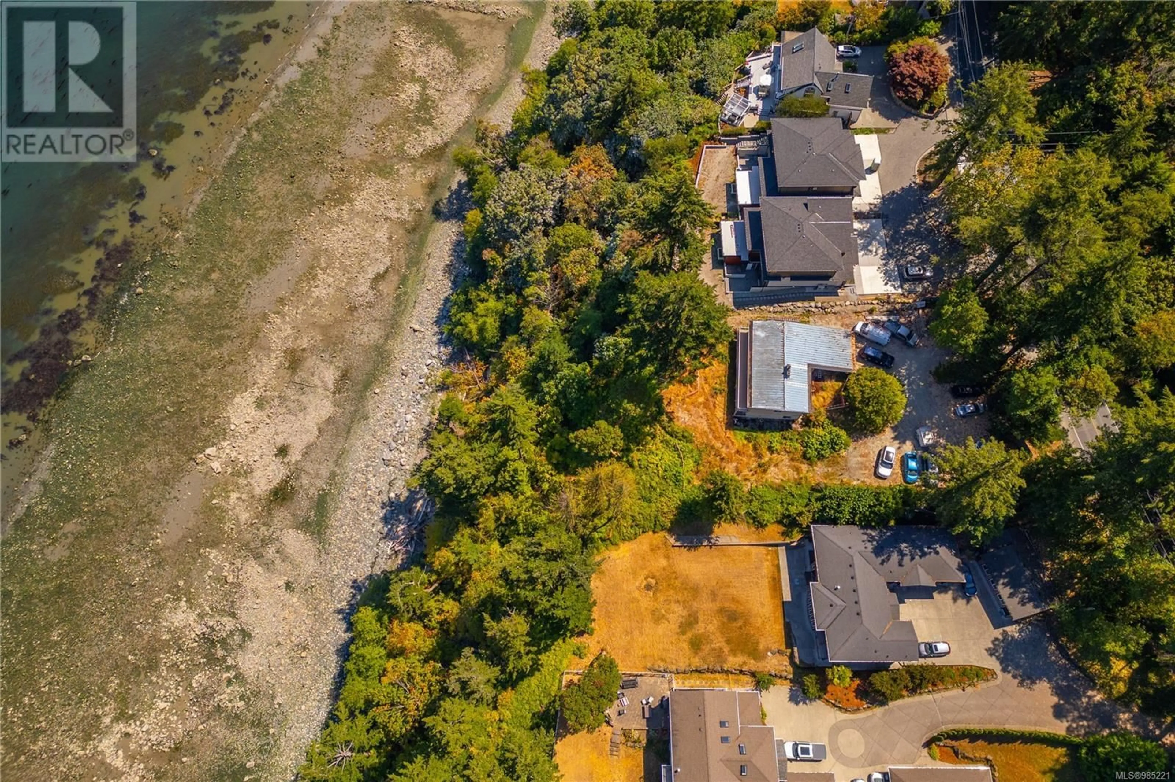 A pic from outside/outdoor area/front of a property/back of a property/a pic from drone, street for 4601 Cordova Bay Rd, Saanich British Columbia V8X3V6