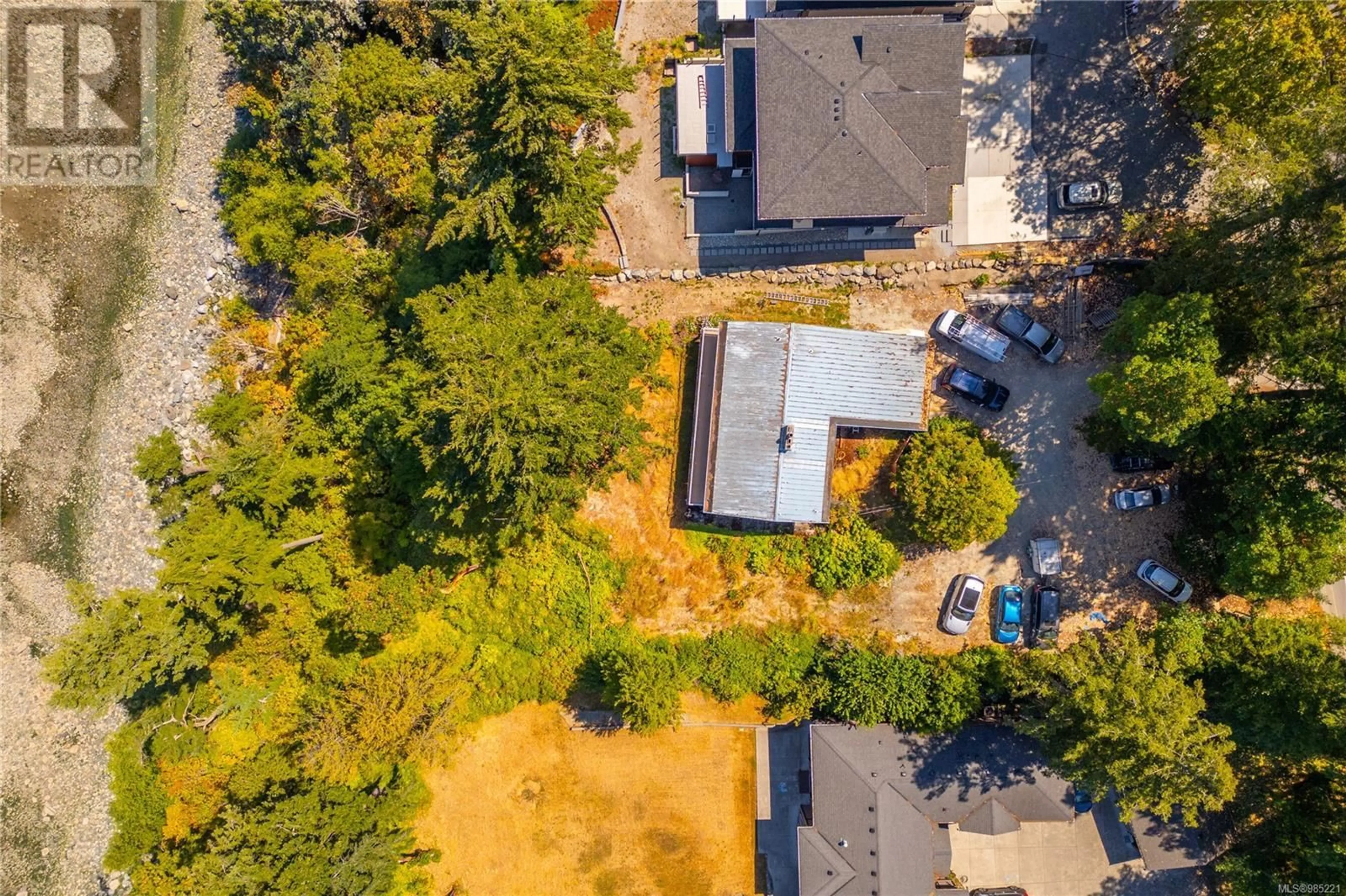 A pic from outside/outdoor area/front of a property/back of a property/a pic from drone, street for 4601 Cordova Bay Rd, Saanich British Columbia V8X3V6