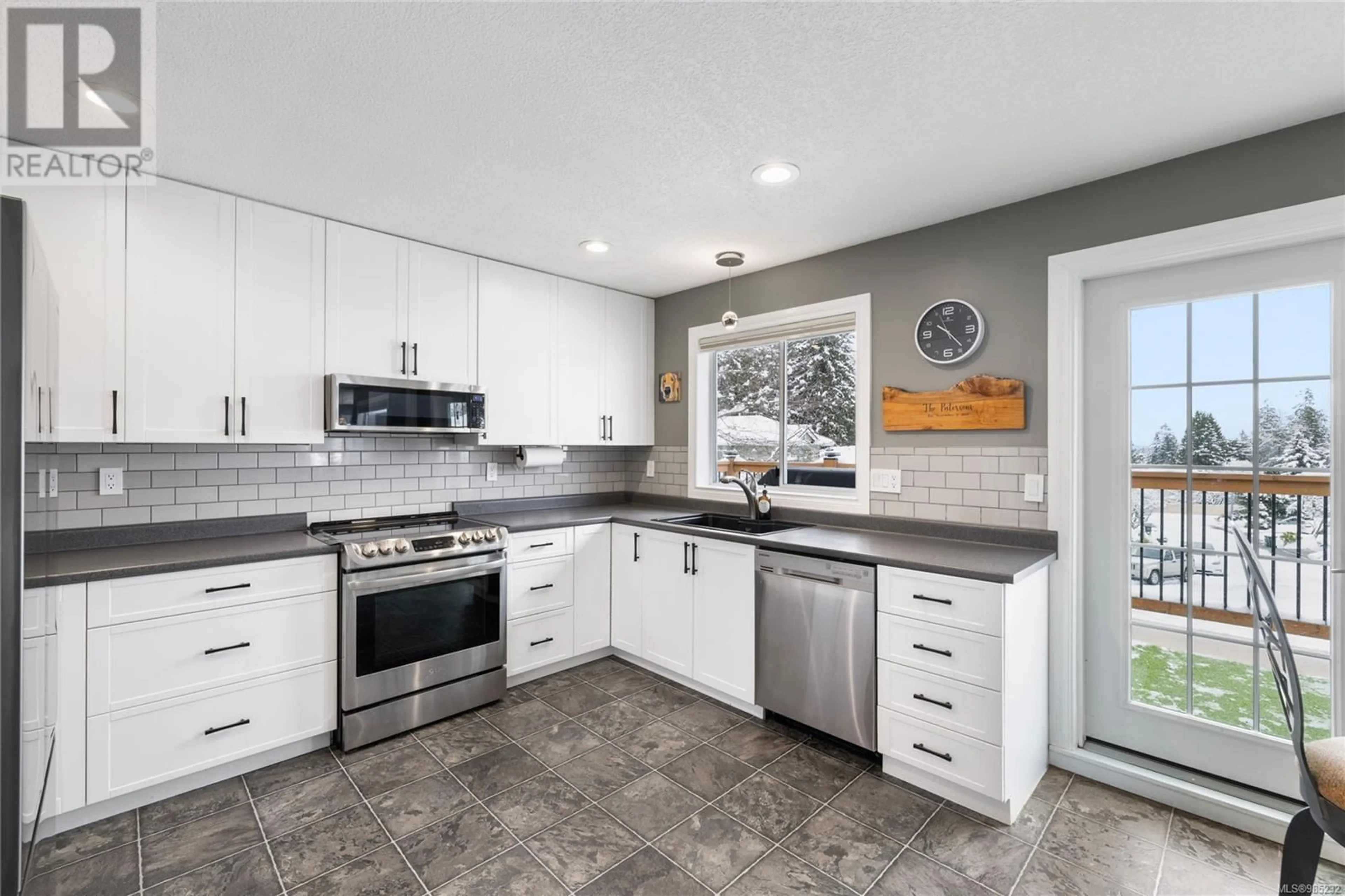 Contemporary kitchen, ceramic/tile floor for 2160 Belcarra Pl, Nanaimo British Columbia V9T5S7