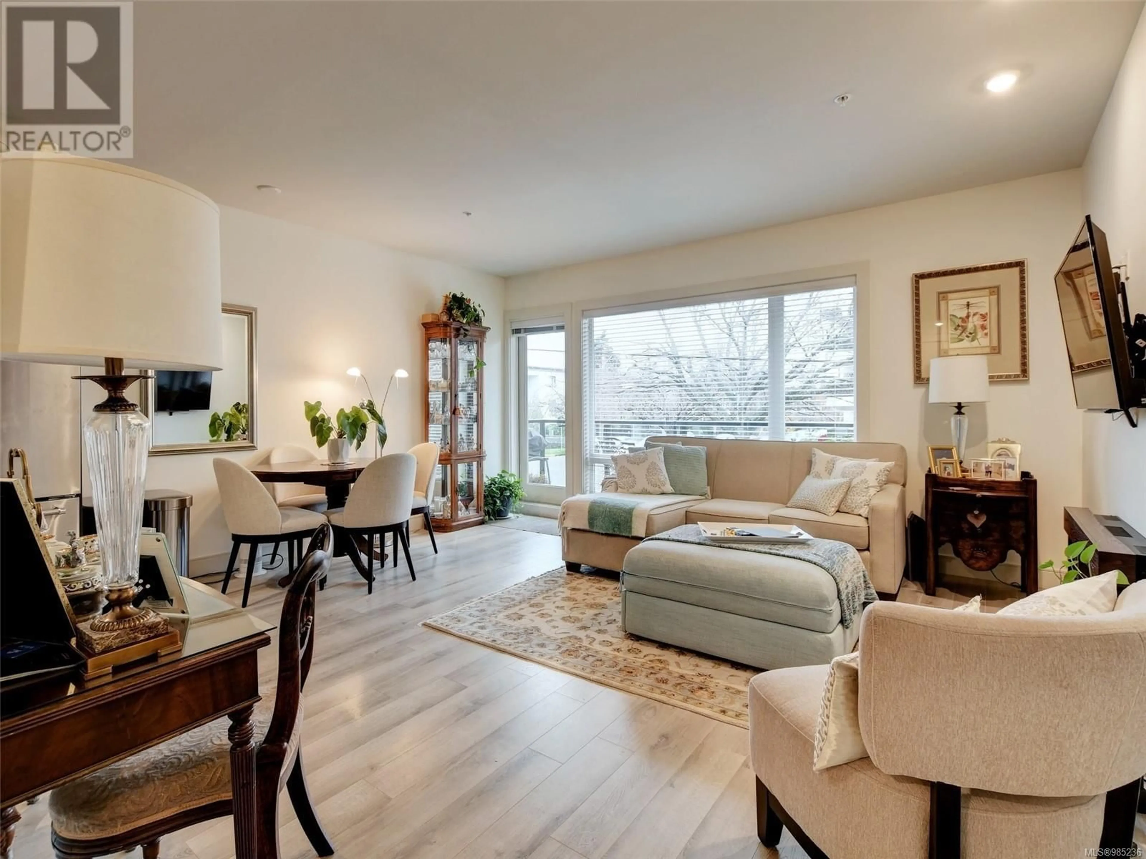 Living room with furniture, wood/laminate floor for 202 300 Michigan St, Victoria British Columbia V8V1R5