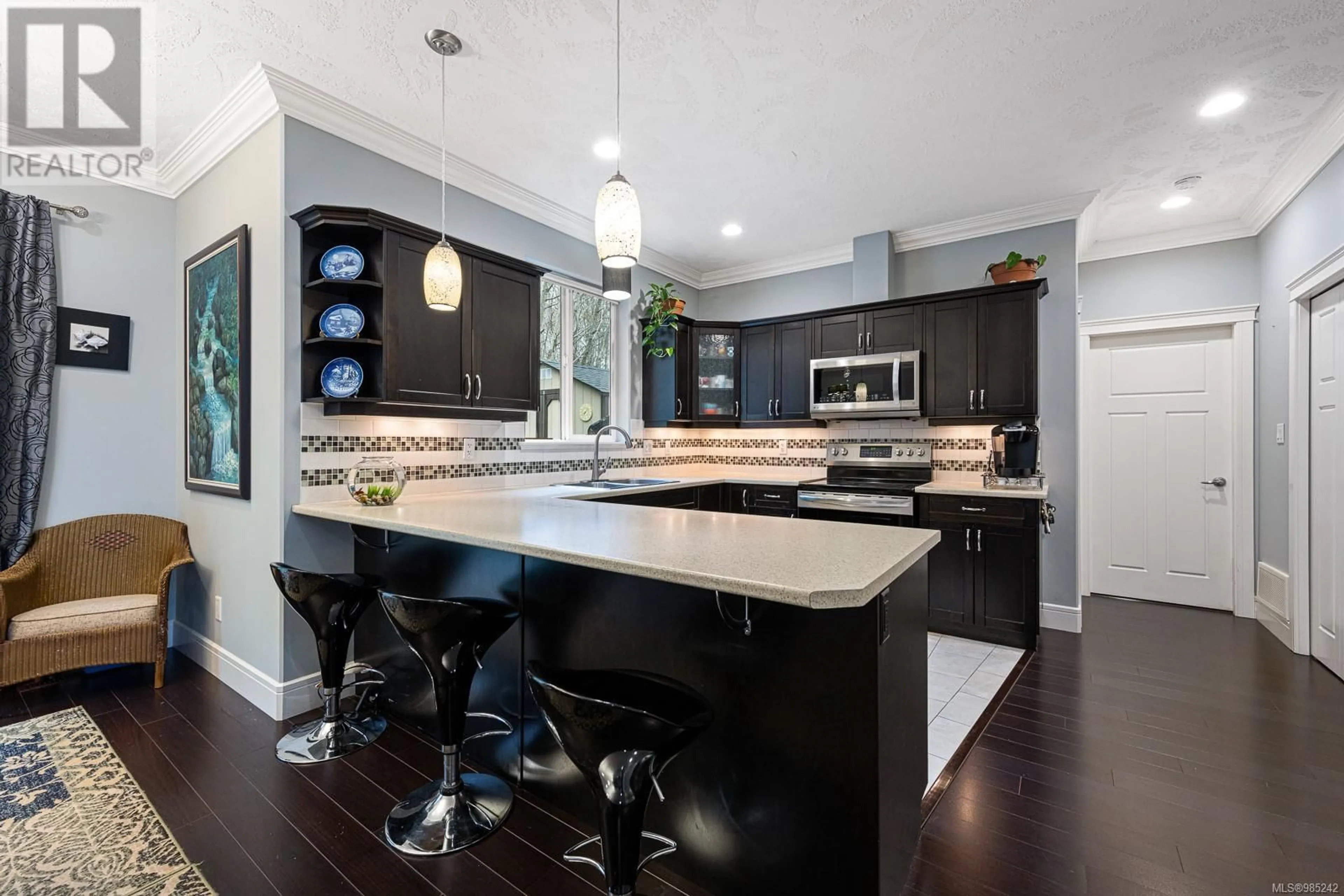 Contemporary kitchen, ceramic/tile floor for 4738 CRUICKSHANK PLACE, Courtenay British Columbia V9N4B6